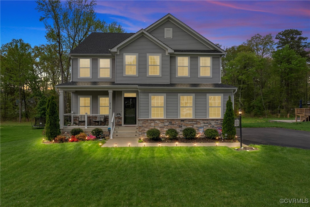 8518 Kingsland Road Richmond, VA 23237 - Photo 1 of 50 a front view of a house with a yard
