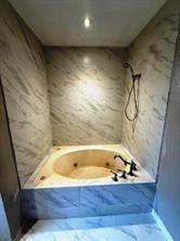 426 Gun Club Road Denison, TX 75021 - Photo 15 of 20 a bathroom with a bathtub and shower