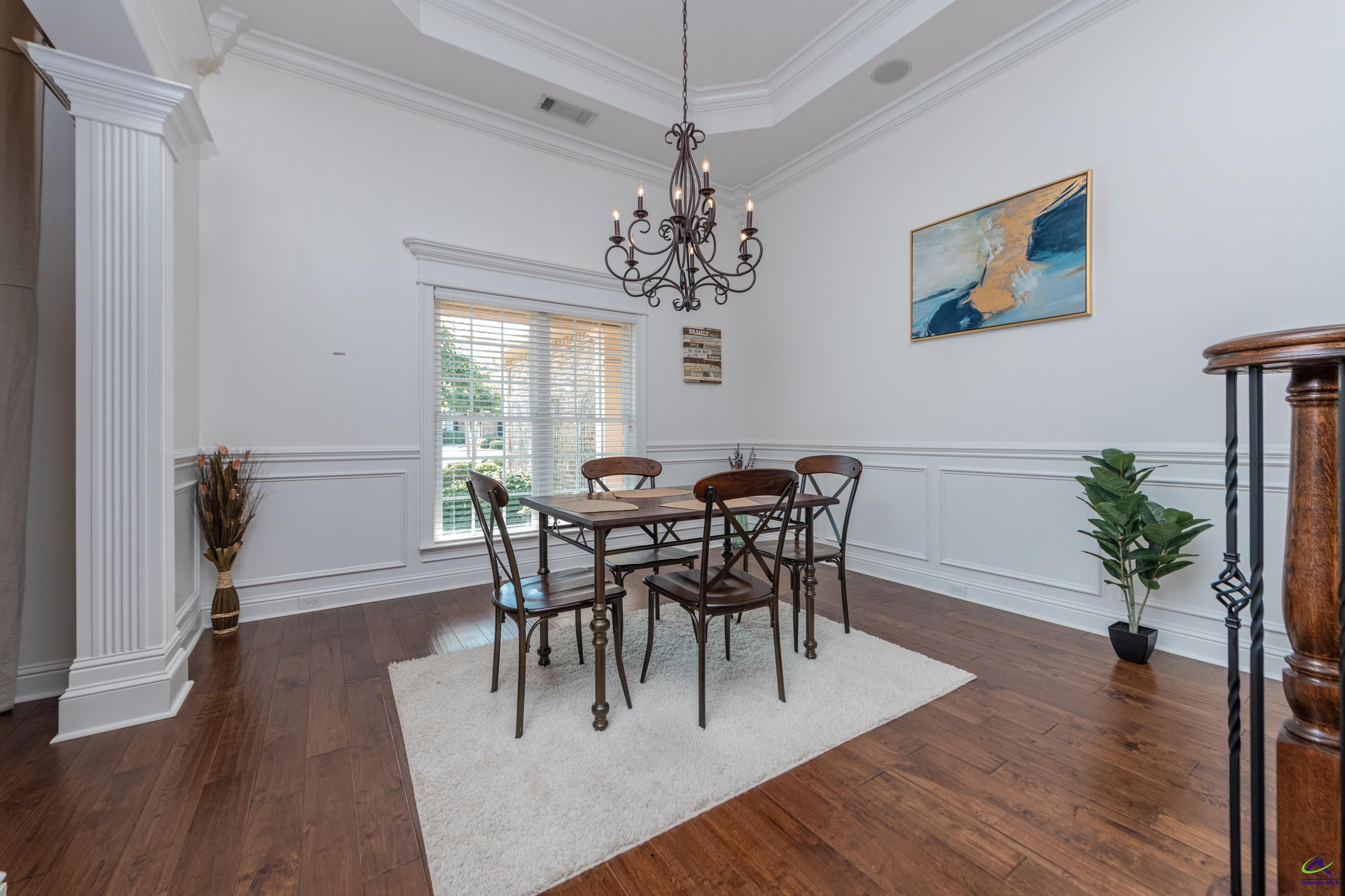 405 Old Bridge Road Warner Robins, GA 31088 - Photo 8 of 58 a view of a dining room with furniture window and wooden floor