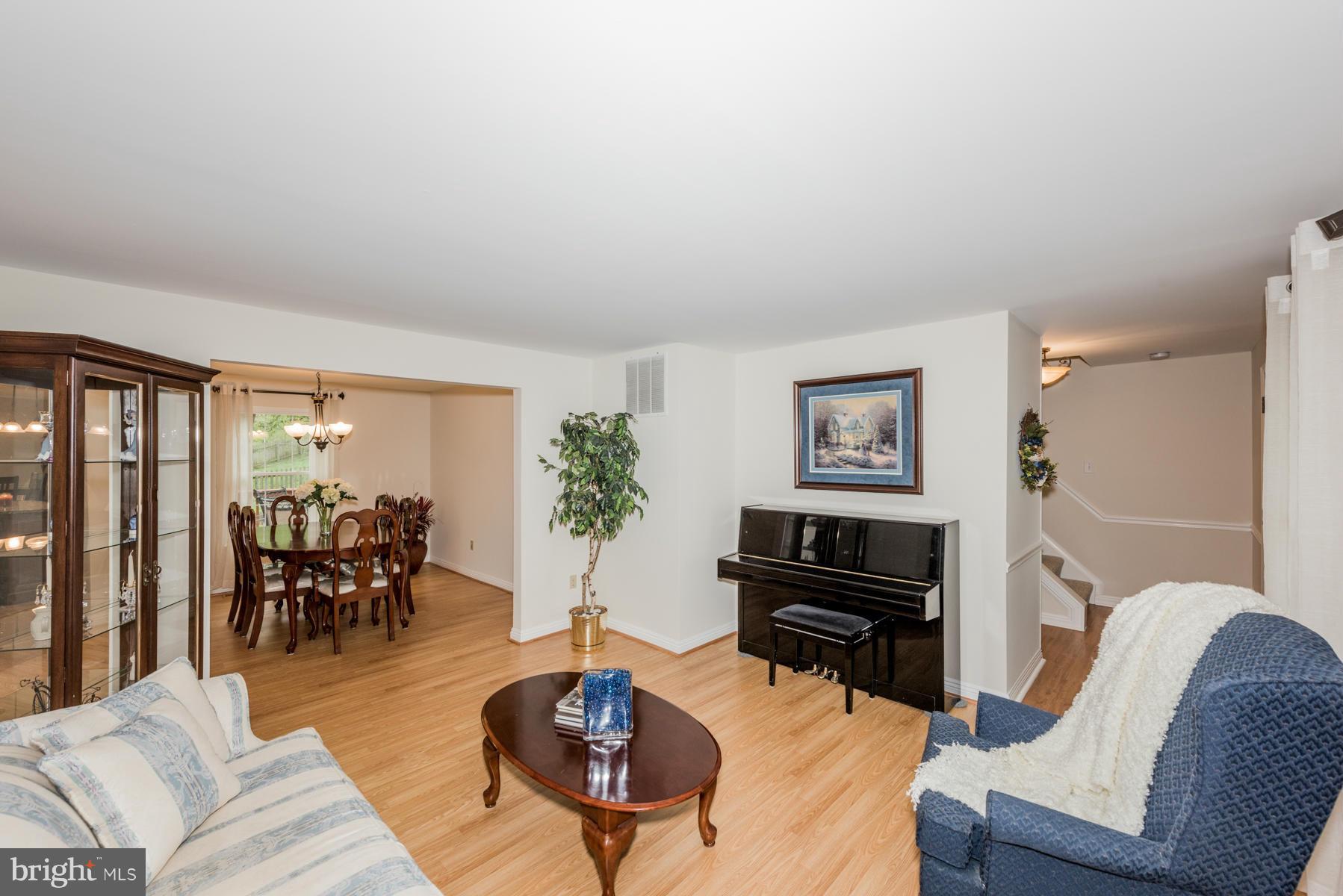6032 Bakers Place Hanover, MD 21076 - Photo 14 of 30 a living room with furniture and wooden floor