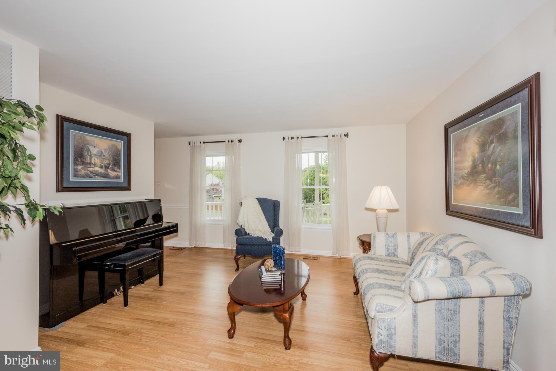 6032 Bakers Place Hanover, MD 21076 - Photo 15 of 30 a living room with furniture and wooden floor