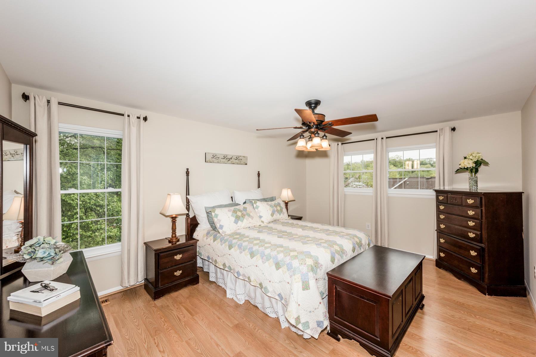 6032 Bakers Place Hanover, MD 21076 - Photo 16 of 30 a bedroom with a bed and furniture
