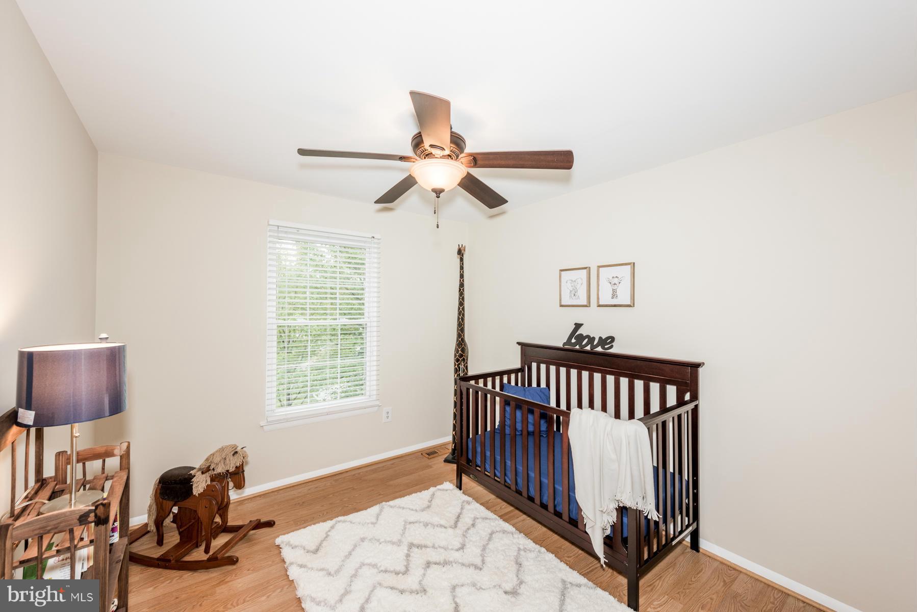 6032 Bakers Place Hanover, MD 21076 - Photo 20 of 30 a bedroom with furniture and a window