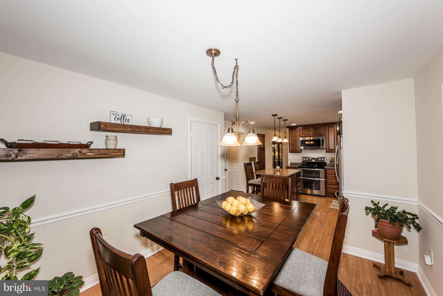 6032 Bakers Place Hanover, MD 21076 - Photo 7 of 30 a view of a dining room with furniture