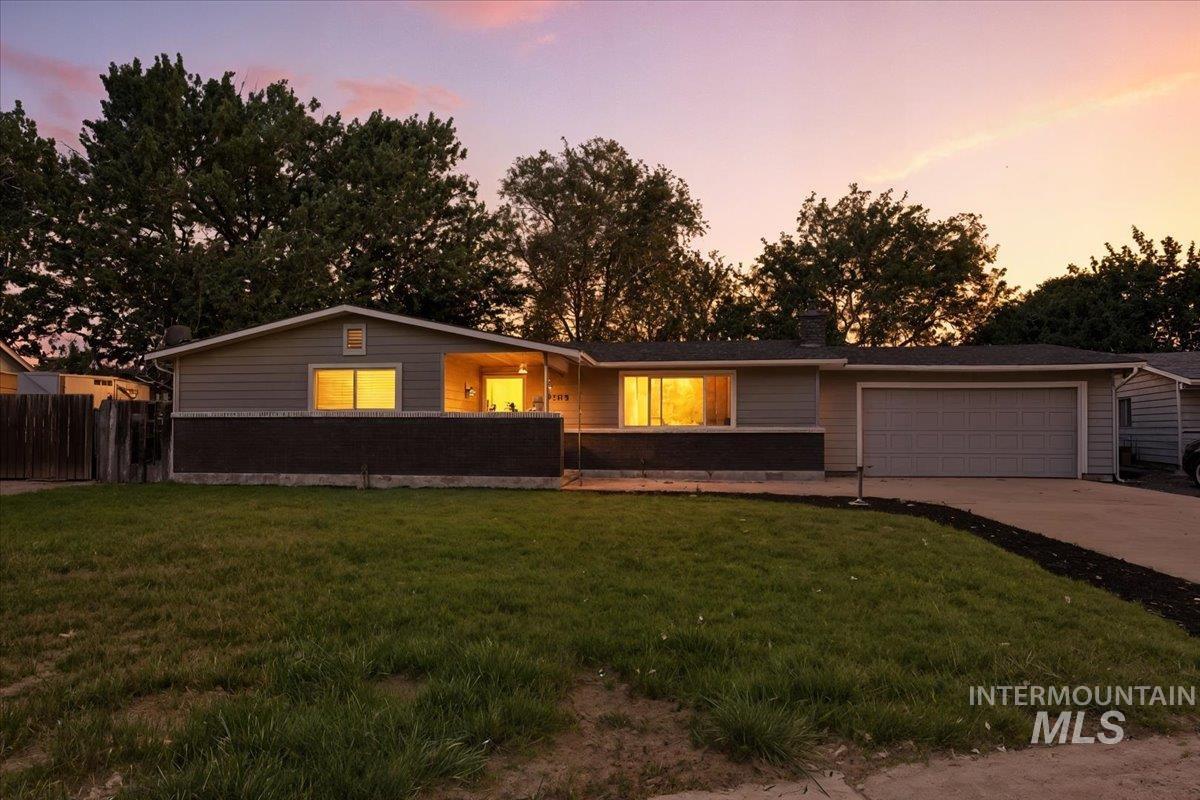 2295 North Bird Street Boise, ID 83704 - Photo 1 of 1 Single story home featuring driveway and a garage