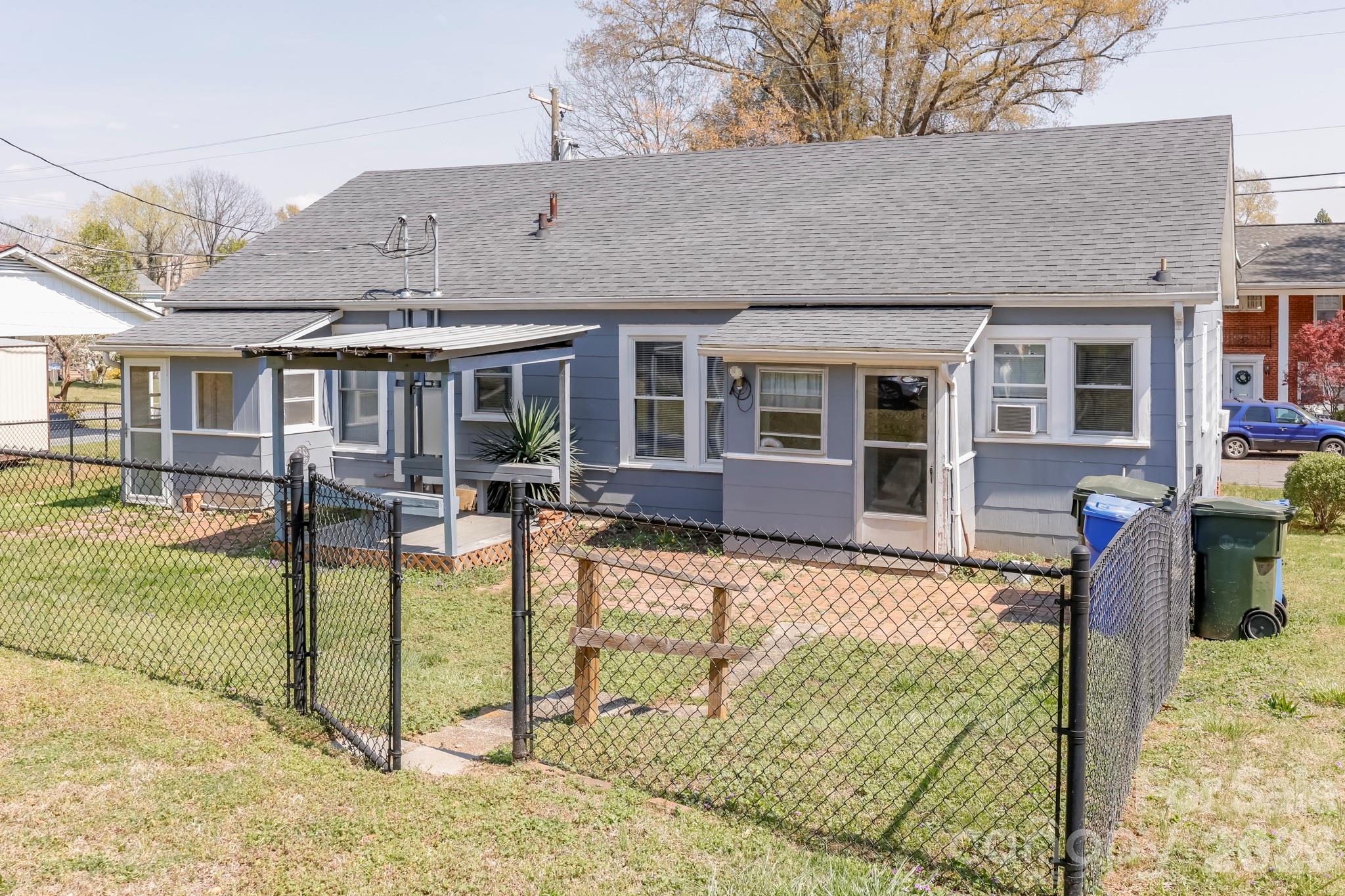 114 South Mitchell Avenue Rutherfordton, NC 28139 - Photo 11 of 29 a view of a house with backyard