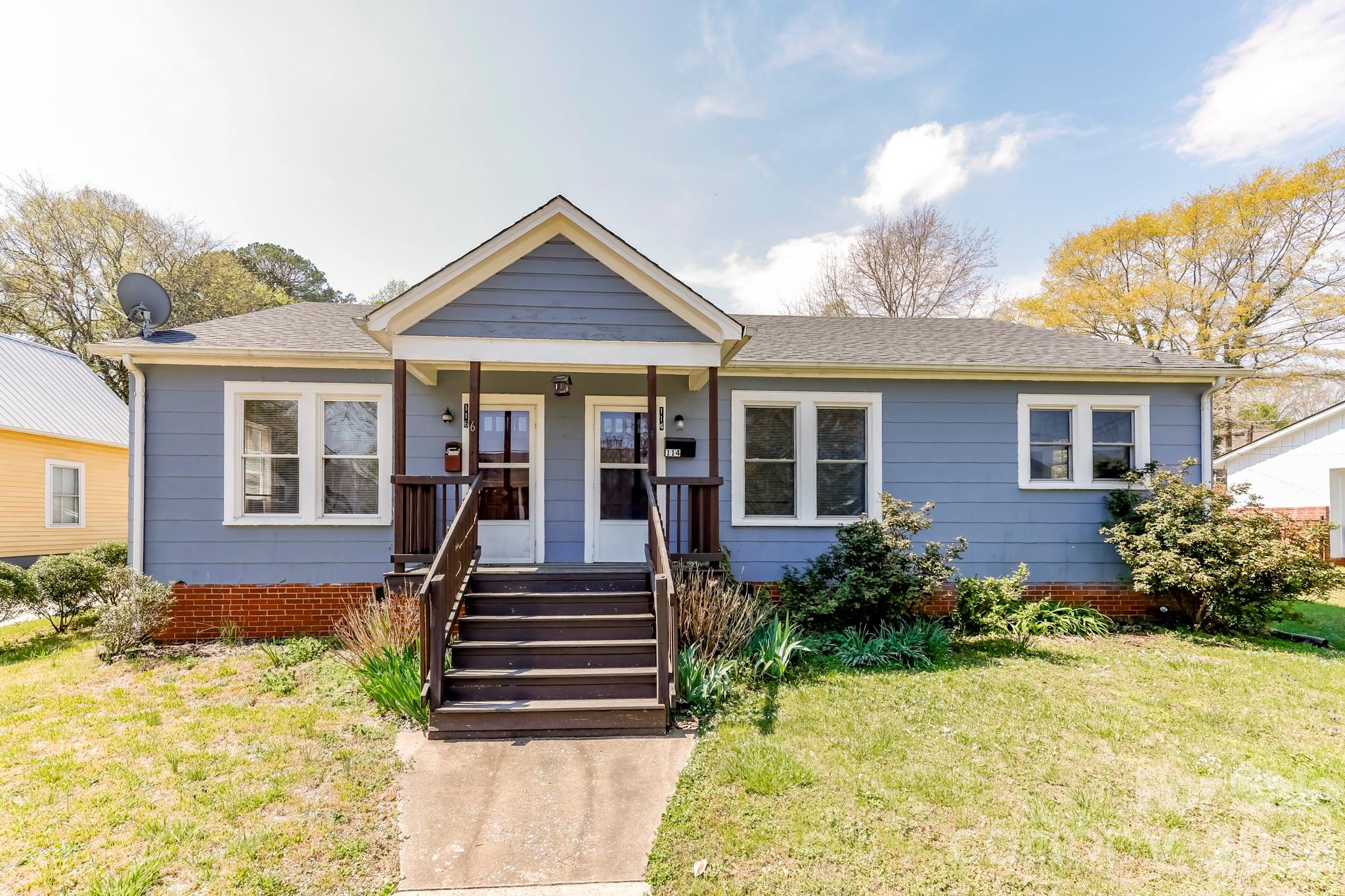 114 South Mitchell Avenue Rutherfordton, NC 28139 - Photo 2 of 29 front view of a house with a yard