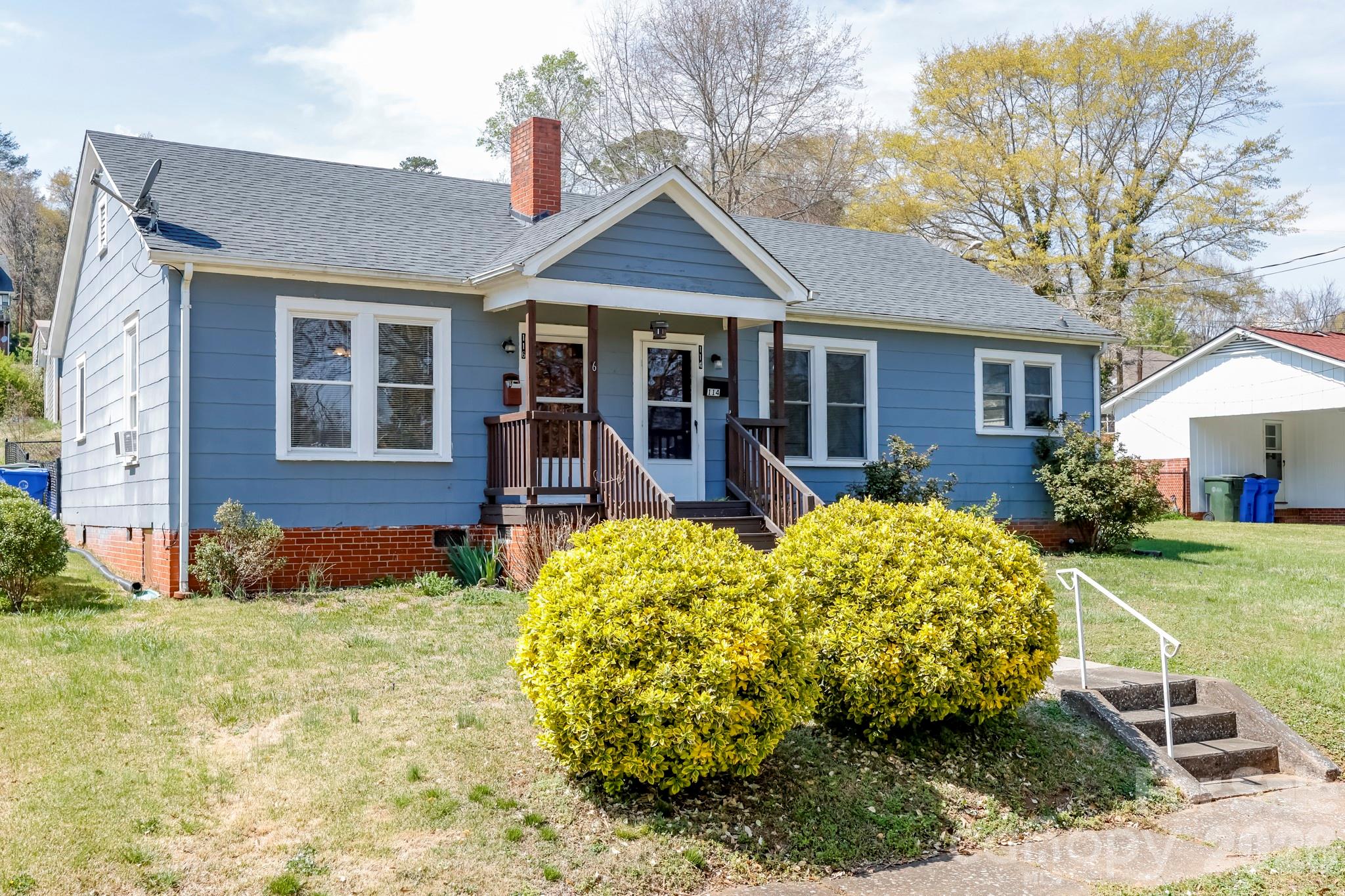 114 South Mitchell Avenue Rutherfordton, NC 28139 - Photo 5 of 29 front view of a house with a yard