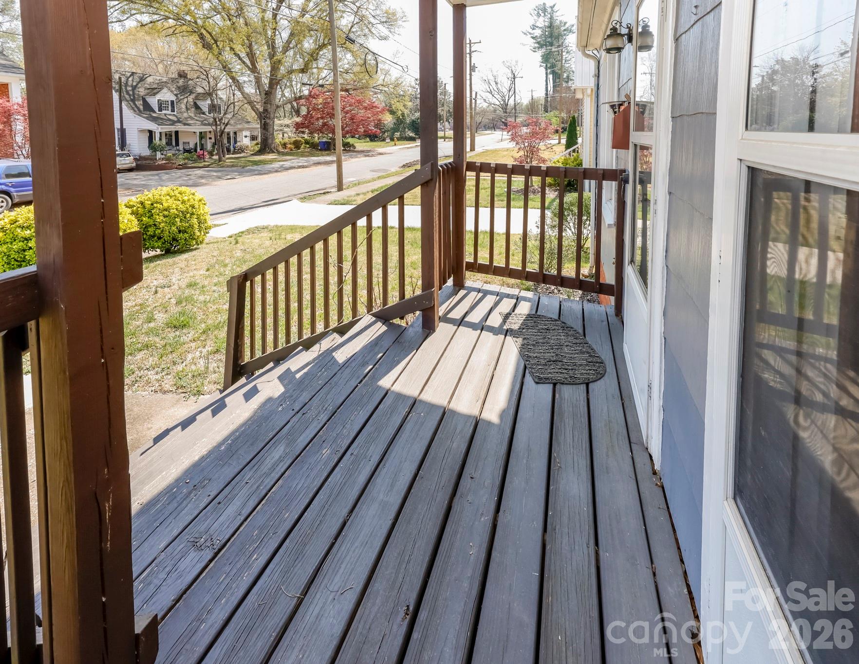 114 South Mitchell Avenue Rutherfordton, NC 28139 - Photo 6 of 29 a view of a balcony with wooden floor
