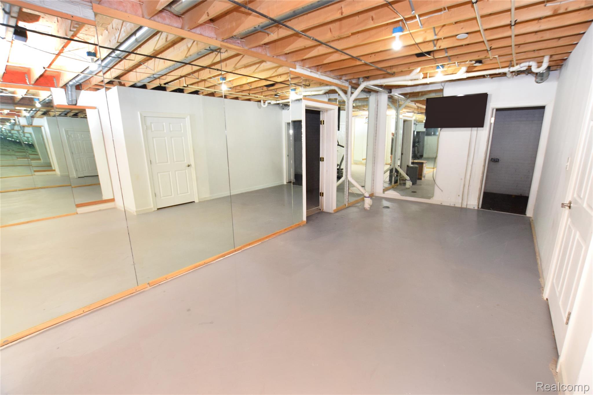 2182 Wiggins Road Fenton, MI 48430 - Photo 20 of 30 Gym Area in Finished Basement