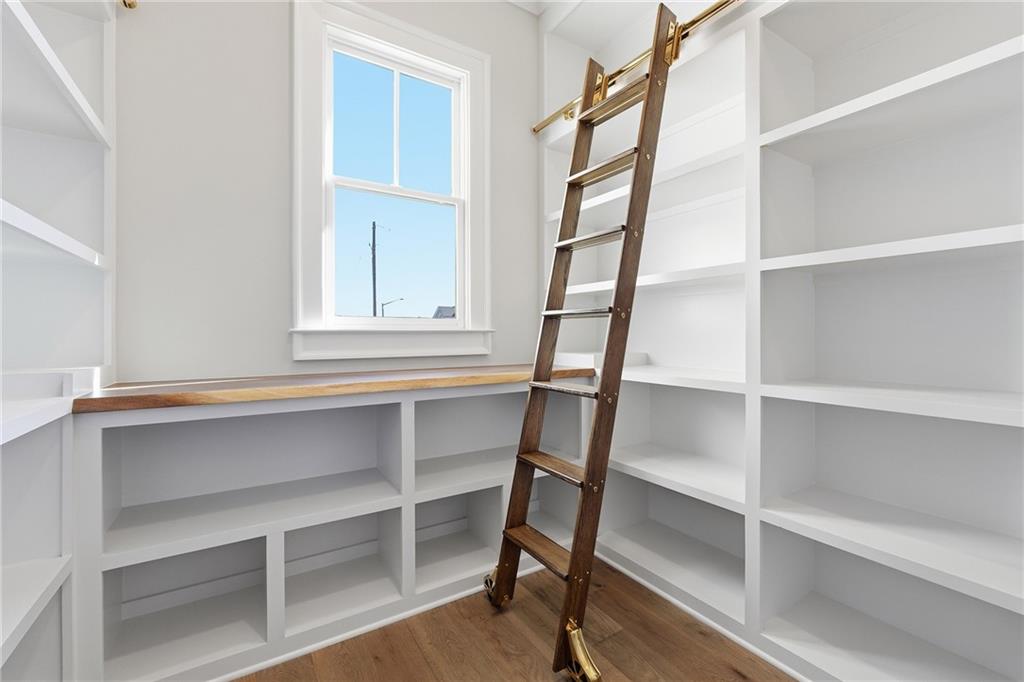 280 County Road Southwest Marietta, GA 30064 - Photo 16 of 40 a view of walk in closet with empty racks