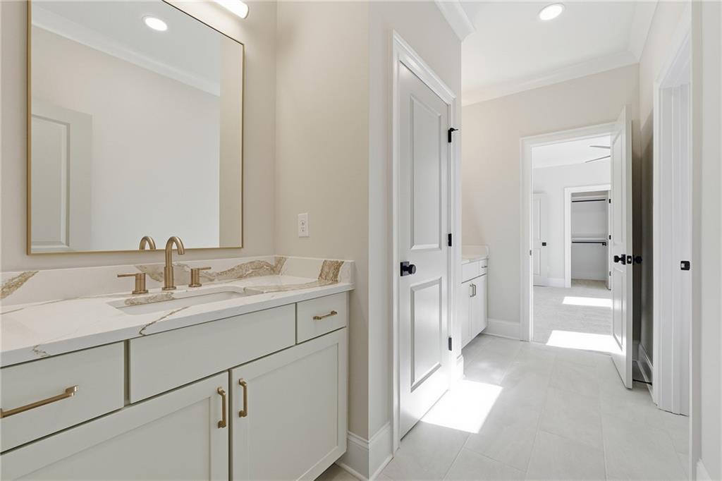 280 County Road Southwest Marietta, GA 30064 - Photo 32 of 40 a bathroom with a sink and a mirror