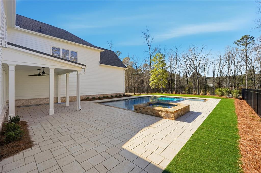 280 County Road Southwest Marietta, GA 30064 - Photo 38 of 40 a swimming pool with outdoor seating and yard
