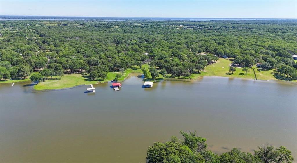 9501 Oakwood Road Quinlan, TX 75474 - Photo 32 of 34 an aerial view of a house with a swimming pool