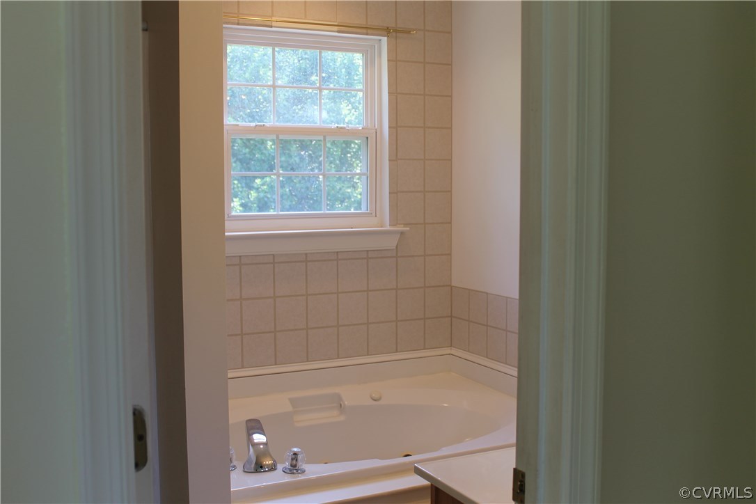 329 Mallory Road Louisa, VA 23093 - Photo 10 of 12 a bathroom with a bathtub