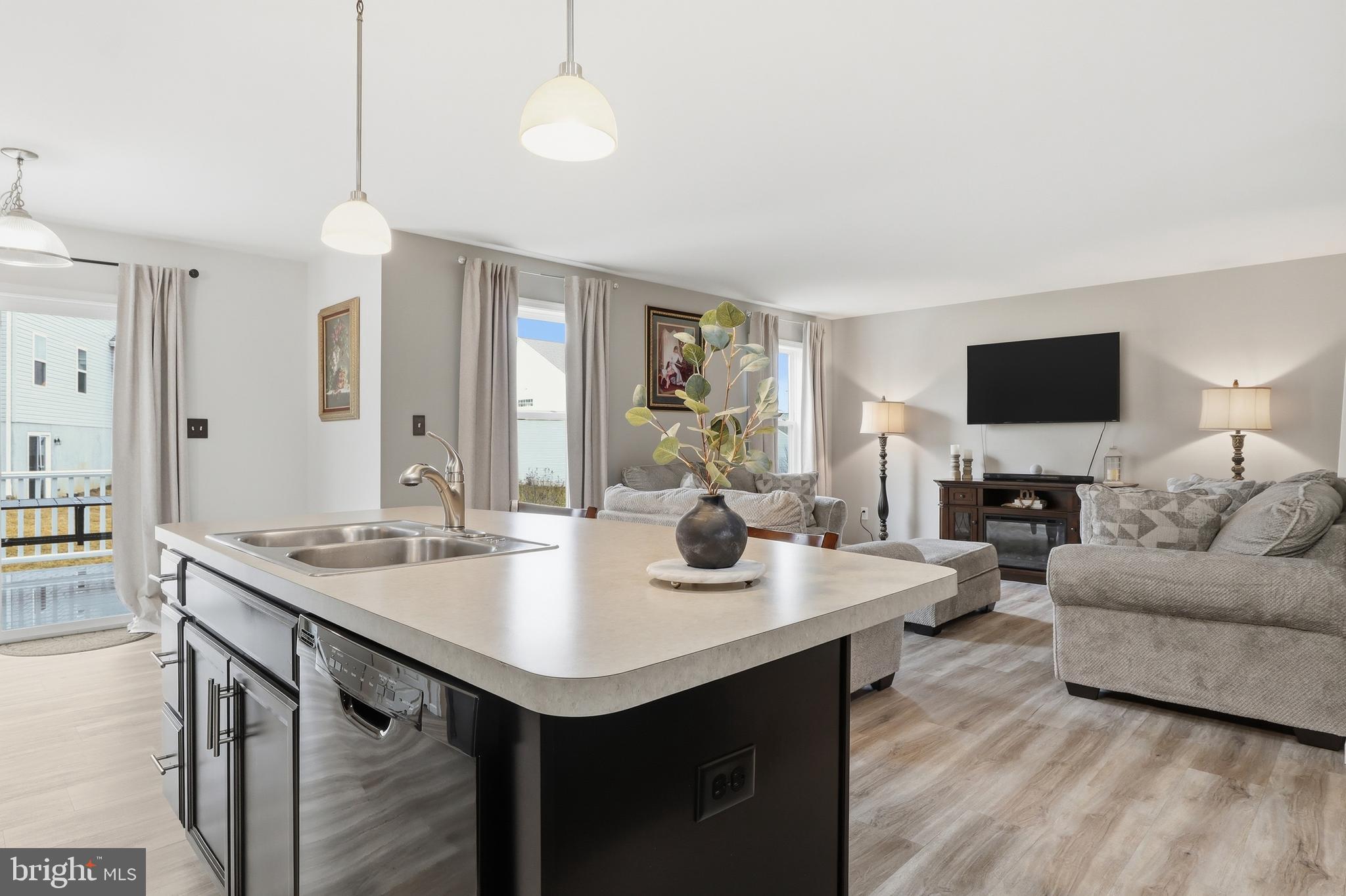 99 McIntosh Lane Aspers, PA 17304 - Photo 16 of 63 a view of kitchen island a sink and living room
