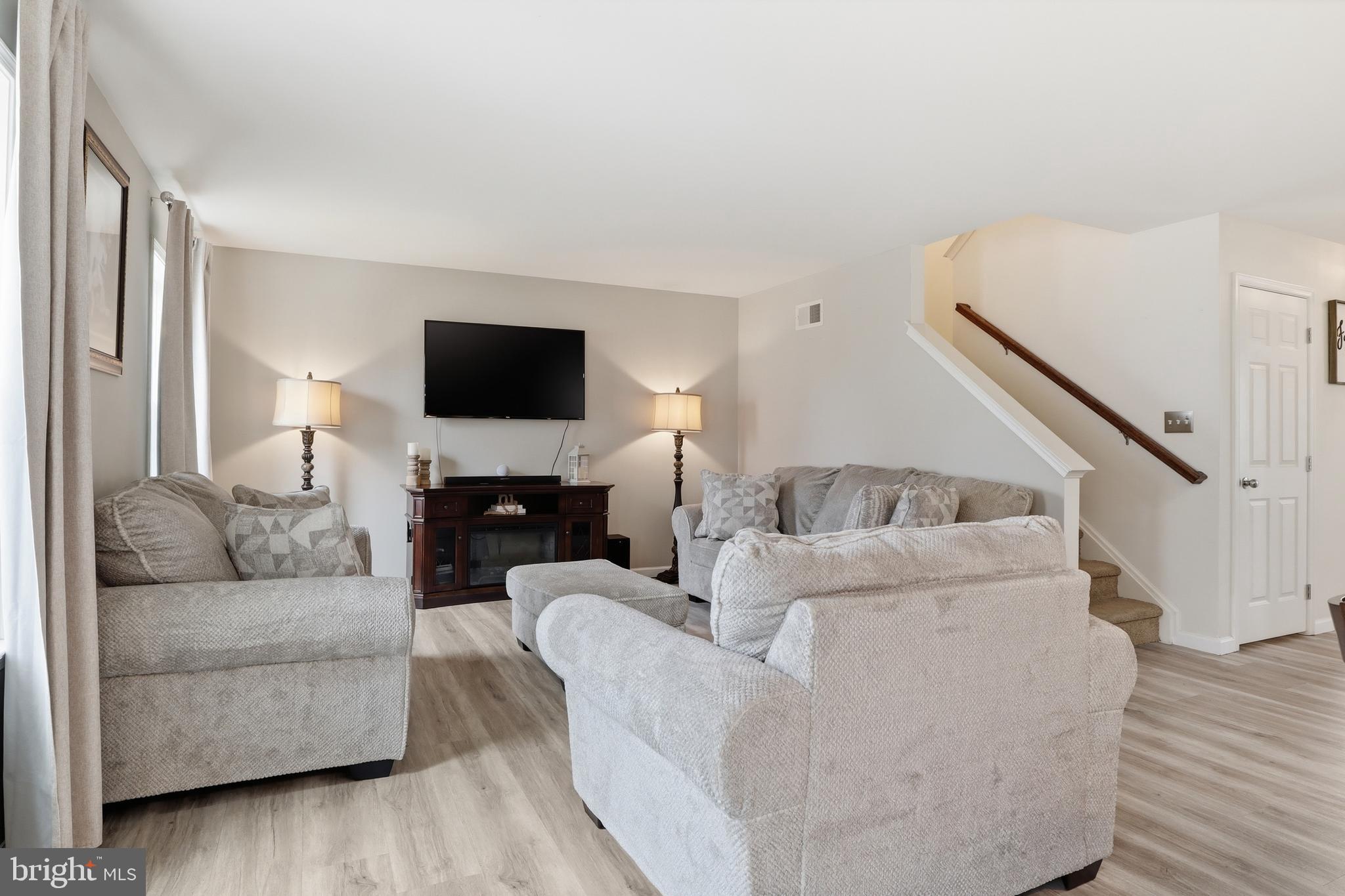 99 McIntosh Lane Aspers, PA 17304 - Photo 17 of 63 a living room with furniture and a flat screen tv