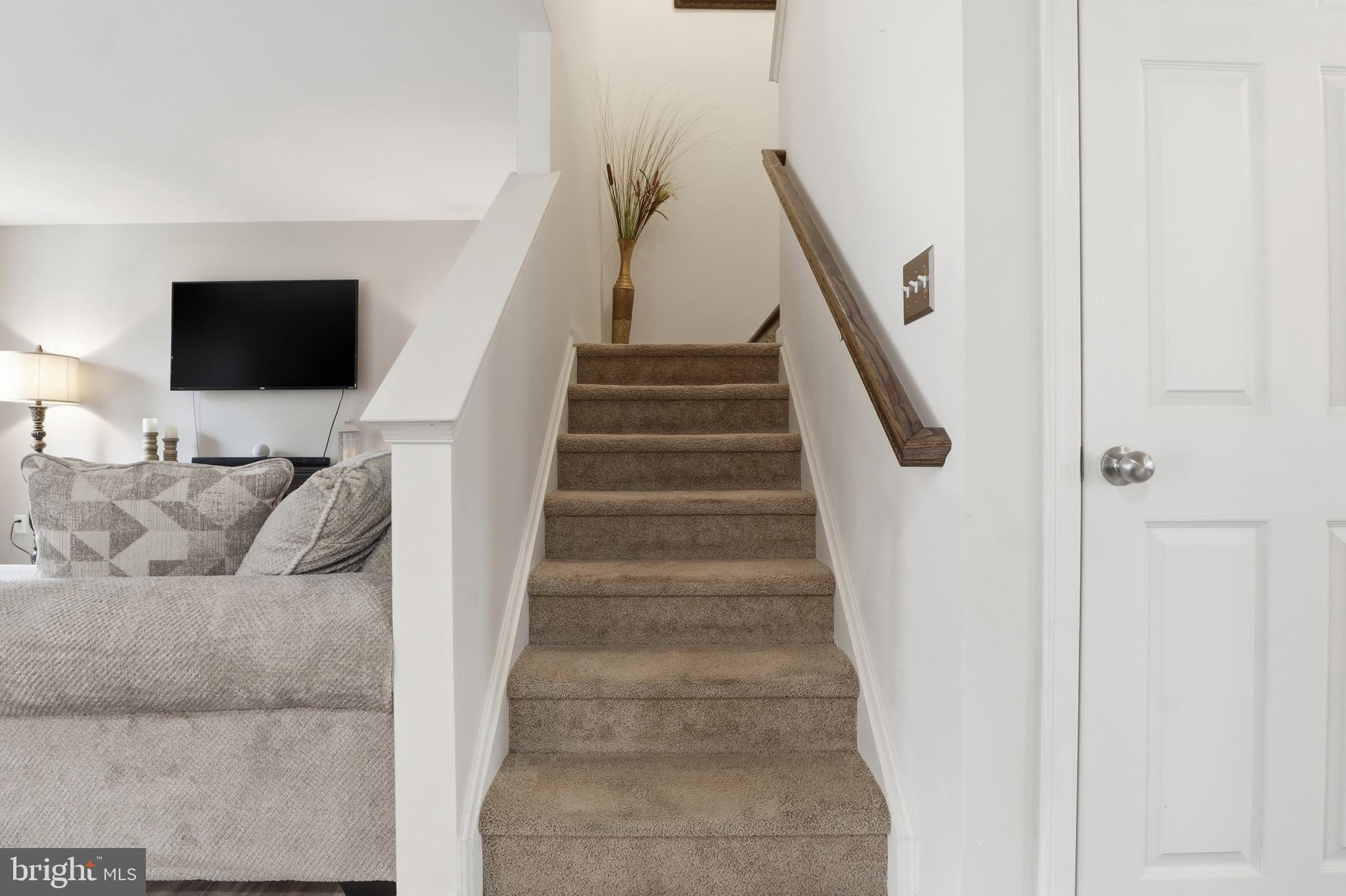 99 McIntosh Lane Aspers, PA 17304 - Photo 22 of 63 a living room with furniture and a flat screen tv