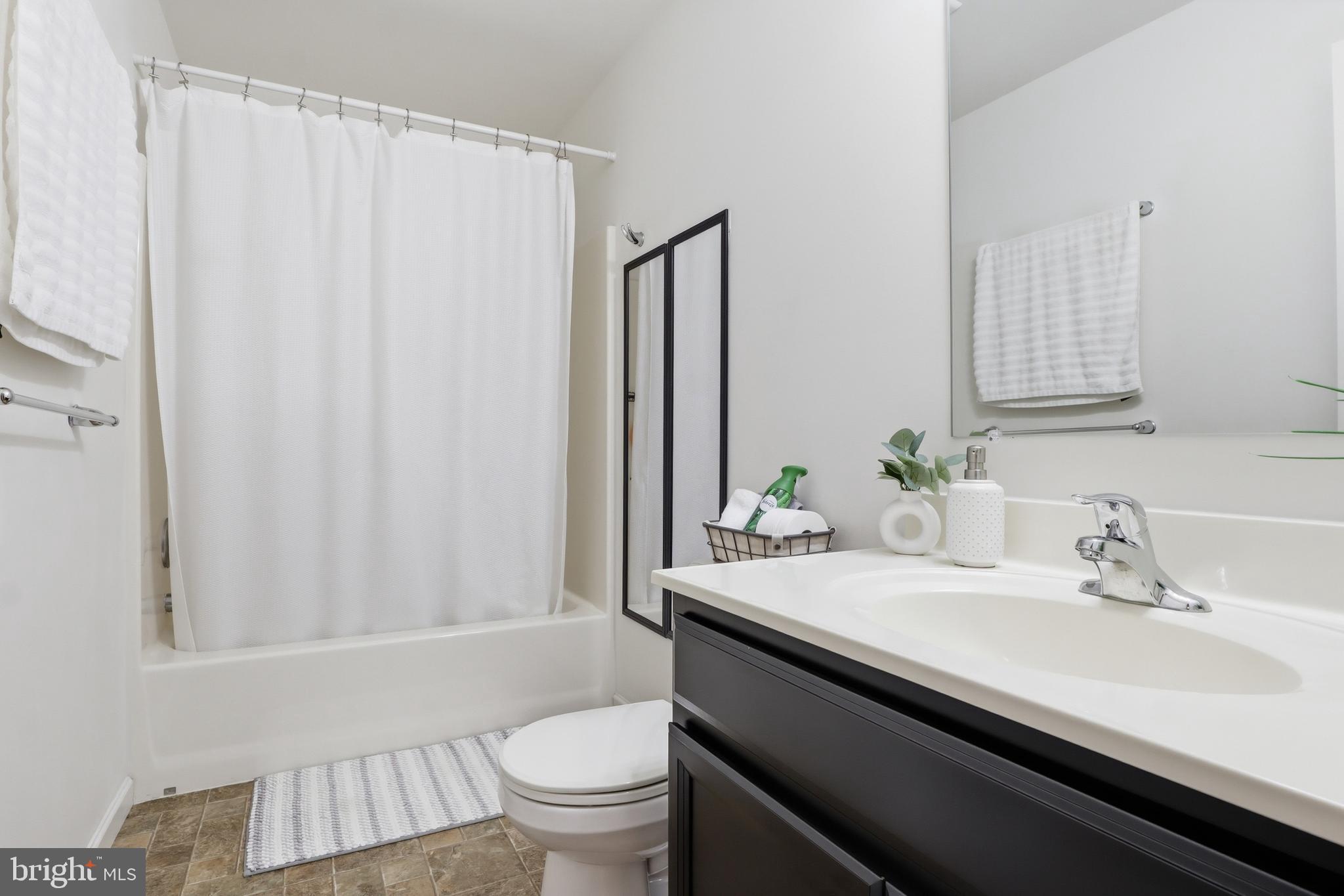 99 McIntosh Lane Aspers, PA 17304 - Photo 26 of 63 a bathroom with a sink and a mirror