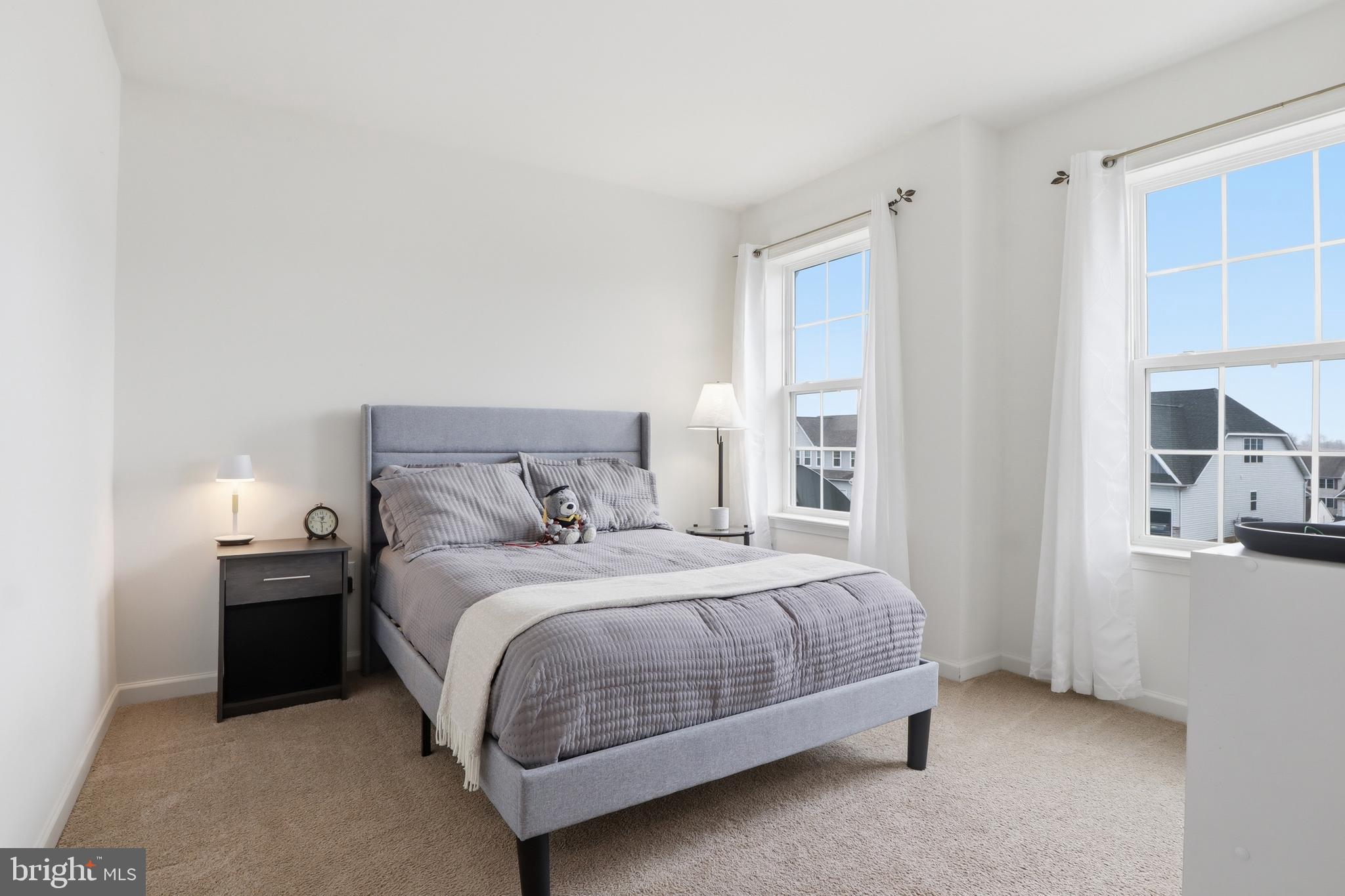 99 McIntosh Lane Aspers, PA 17304 - Photo 29 of 63 a bedroom with a bed and cabinets