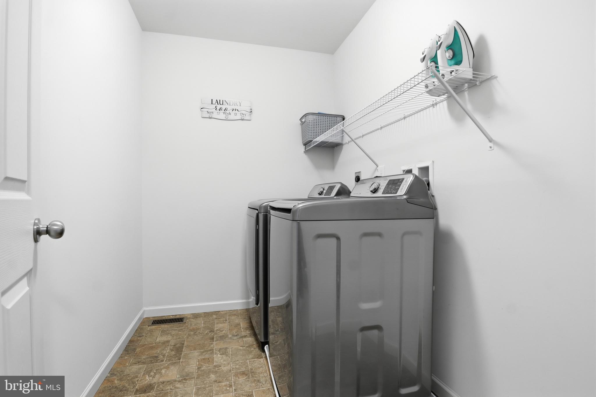 99 McIntosh Lane Aspers, PA 17304 - Photo 31 of 63 a bathroom with a sink a vanity and mirror