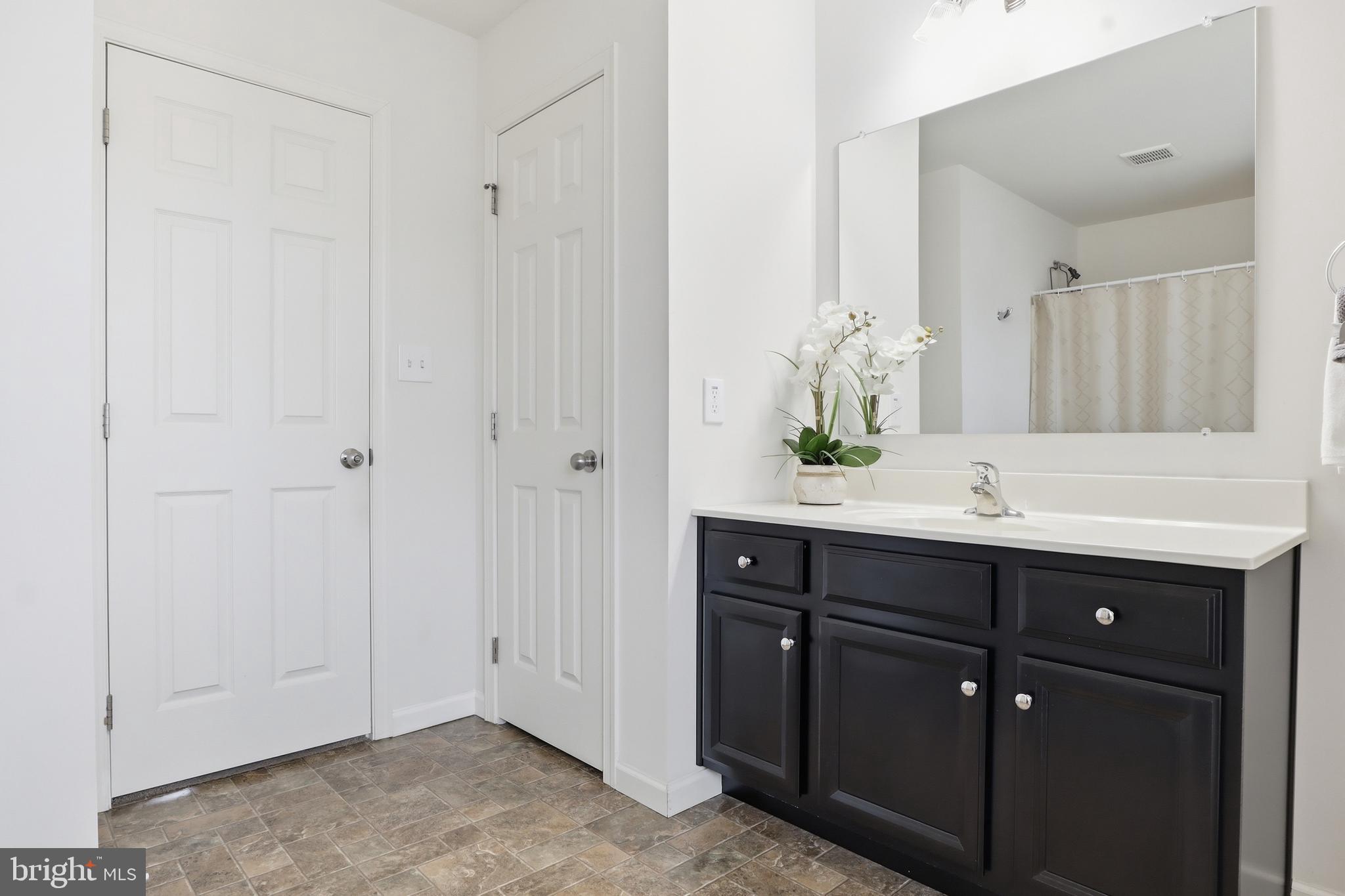 99 McIntosh Lane Aspers, PA 17304 - Photo 34 of 63 a bathroom with a sink and a mirror