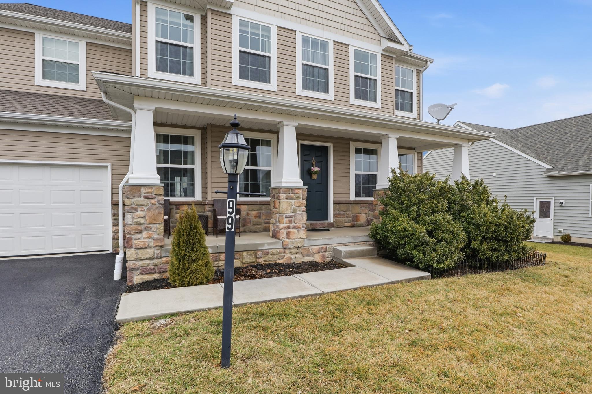 99 McIntosh Lane Aspers, PA 17304 - Photo 5 of 63 a front view of a house with garden