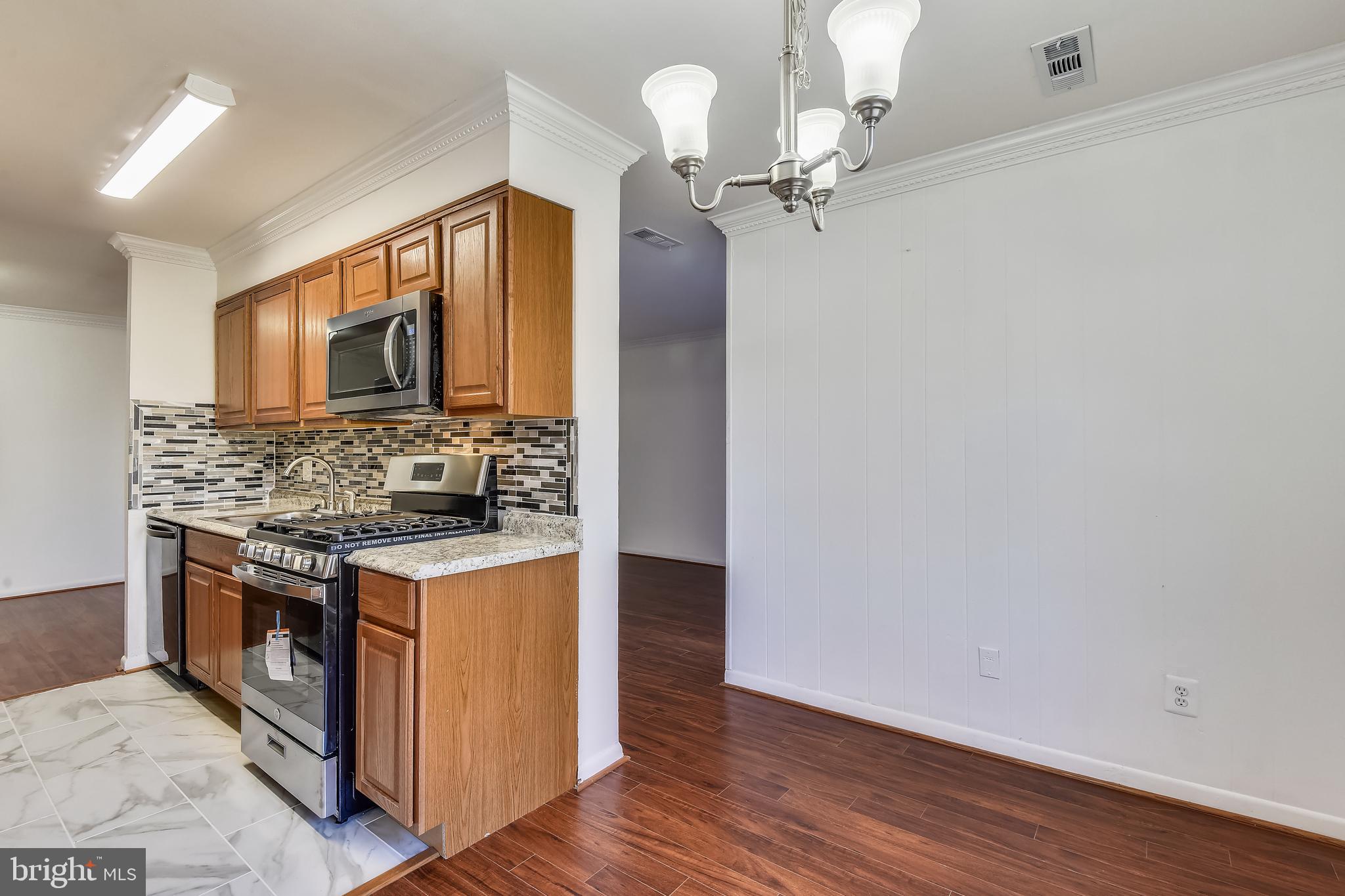 8300 Tobin Road, Unit 13 Annandale, VA 22003 - Photo 13 of 36 Renovated kitchen
