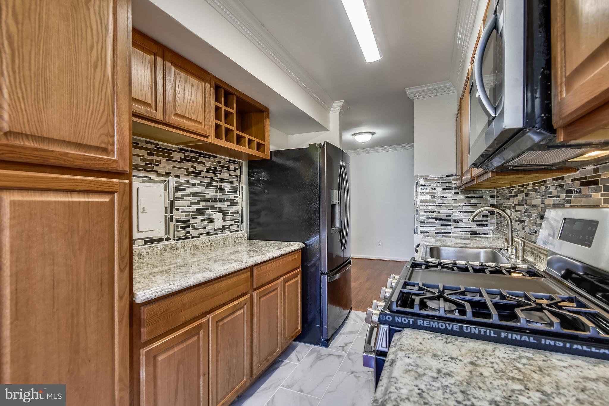 8300 Tobin Road, Unit 13 Annandale, VA 22003 - Photo 16 of 36 Renovated kitchen