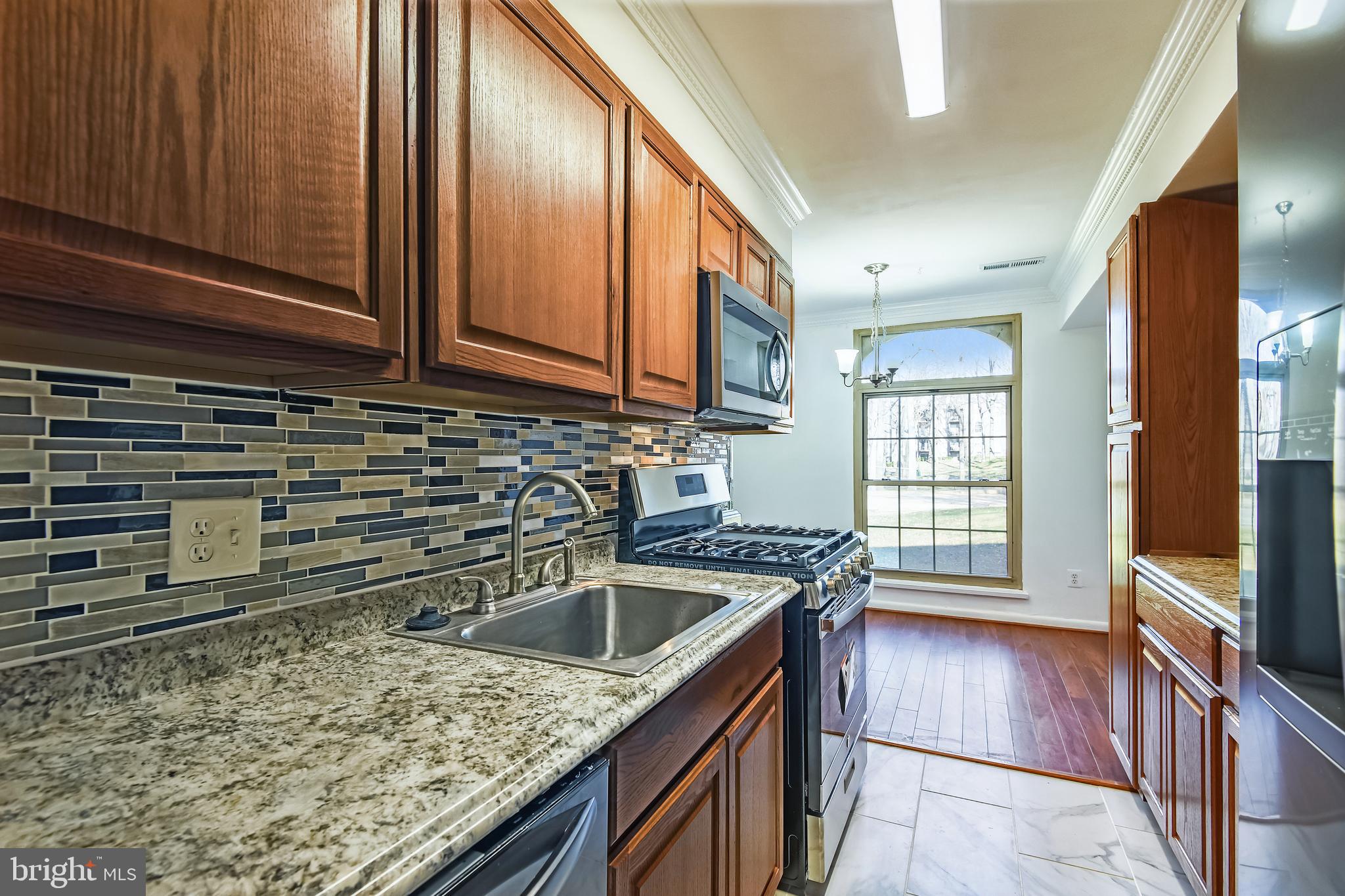 8300 Tobin Road, Unit 13 Annandale, VA 22003 - Photo 17 of 36 Renovated kitchen