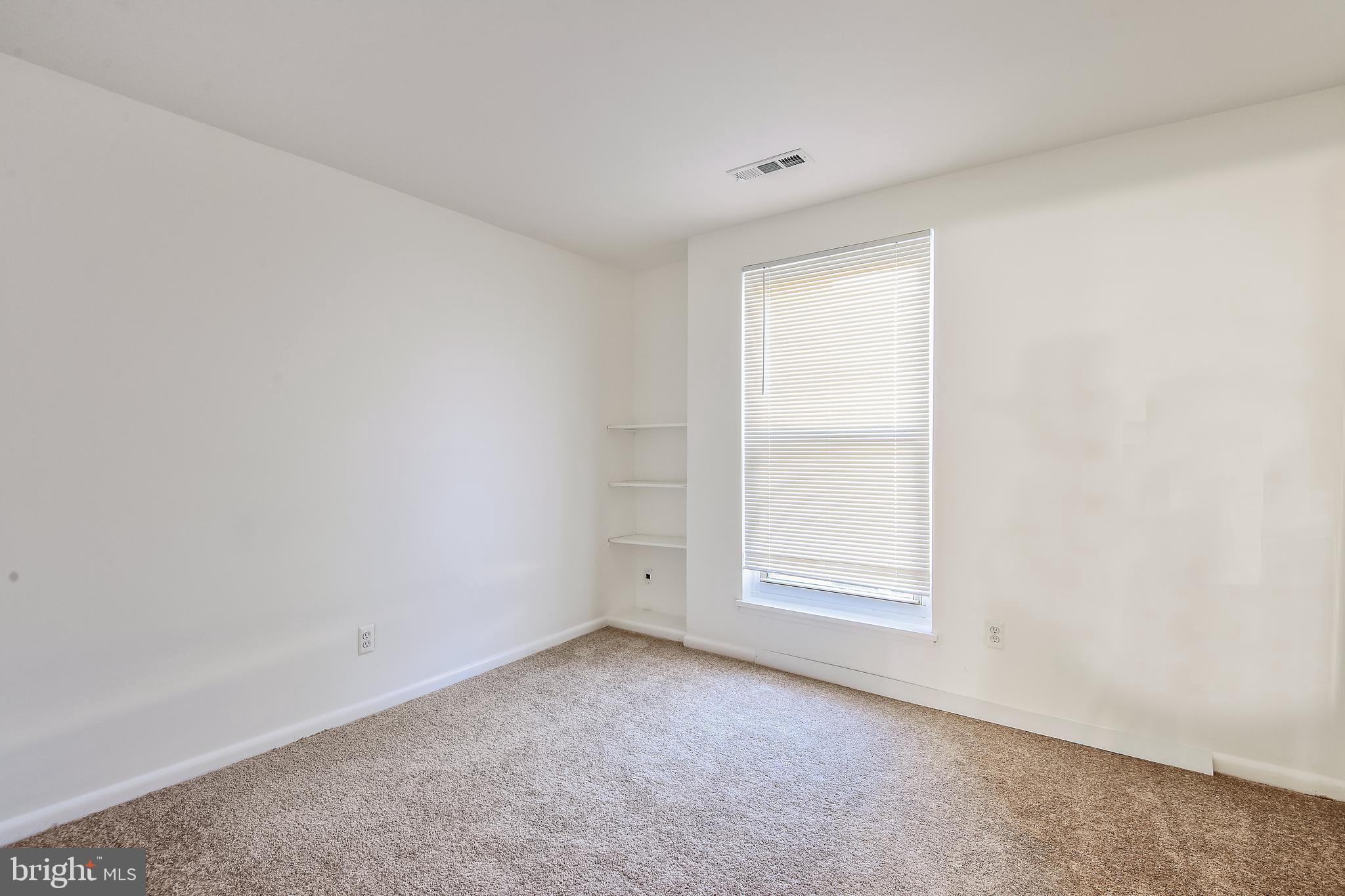 8300 Tobin Road, Unit 13 Annandale, VA 22003 - Photo 22 of 36 First bedroom
