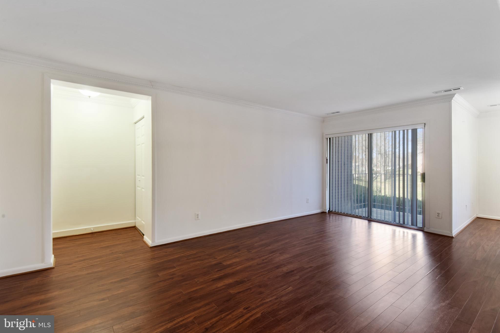 8300 Tobin Road, Unit 13 Annandale, VA 22003 - Photo 4 of 36 Living room with balcony