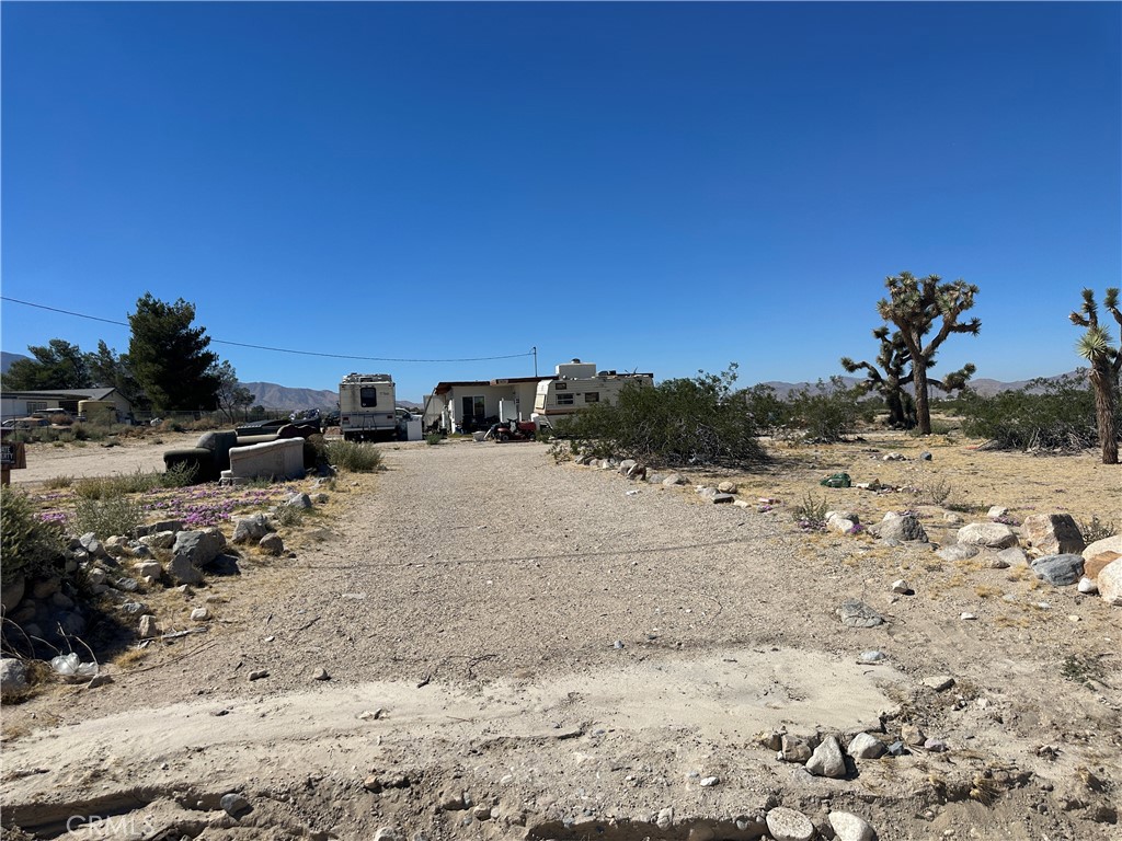 9474 Anza Trail Lucerne Valley, CA 92356 - Photo 1 of 7 a view of ocean beach and snow