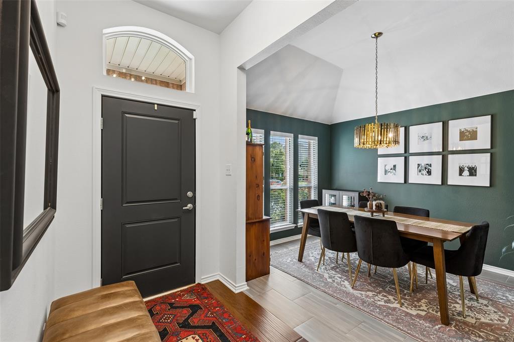 7703 Worthing Street Dallas, TX 75252 - Photo 2 of 21 a workspace with furniture and window