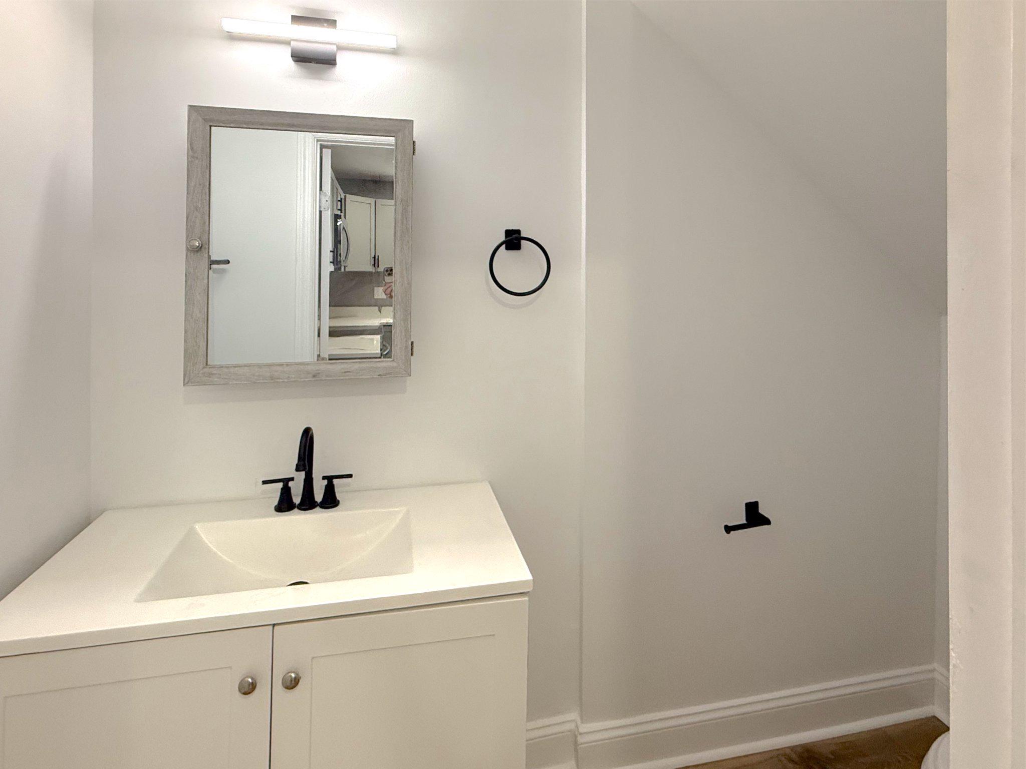 3703 6th Street, Unit 2 Baltimore, MD 21225 - Photo 5 of 20 1st floor powder room