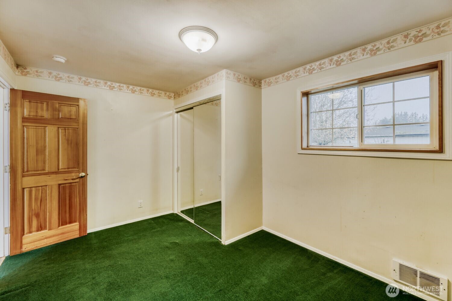 208 78th Place Southwest Everett, WA 98203 - Photo 19 of 36 a view of an empty room with window and refrigerator
