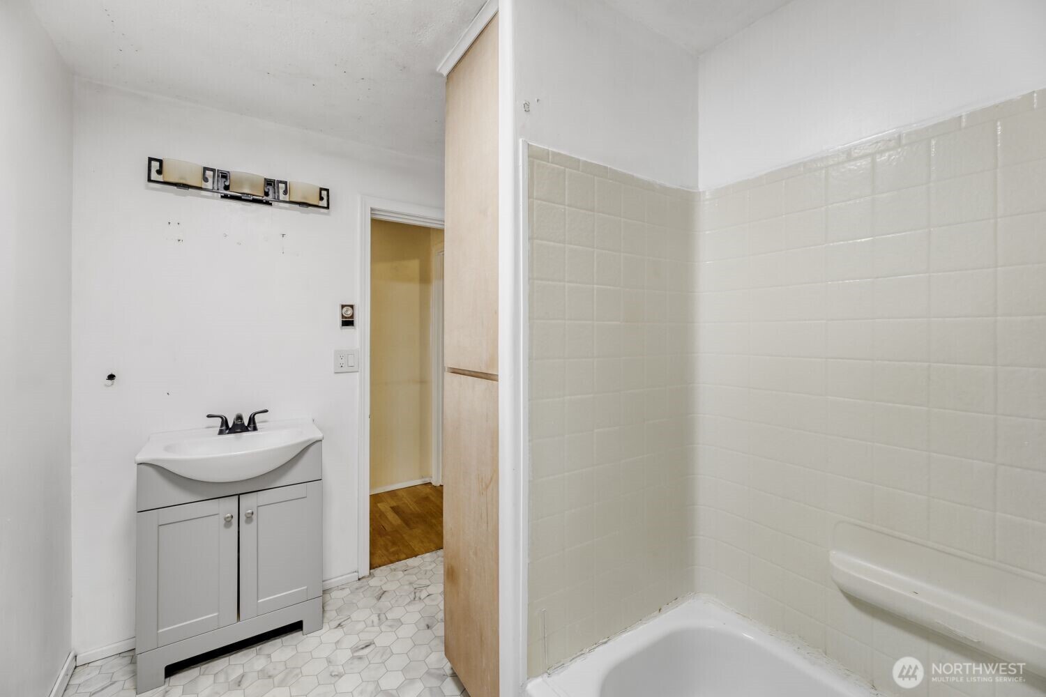 208 78th Place Southwest Everett, WA 98203 - Photo 23 of 36 a bathroom with a sink a toilet and shower