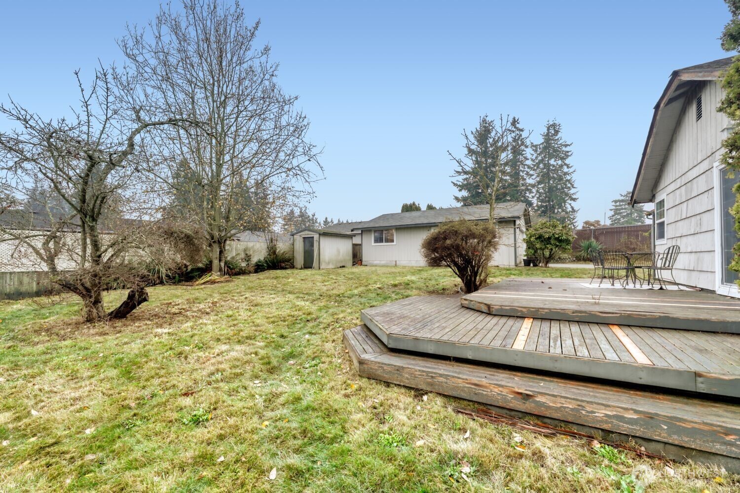 208 78th Place Southwest Everett, WA 98203 - Photo 27 of 36 a front view of a house with a yard