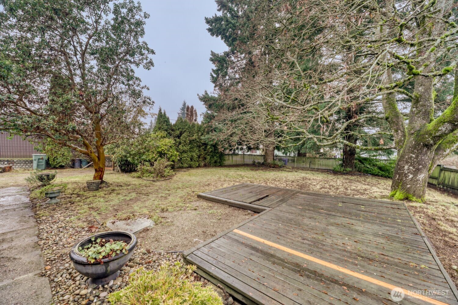 208 78th Place Southwest Everett, WA 98203 - Photo 29 of 36 a view of a backyard with trees