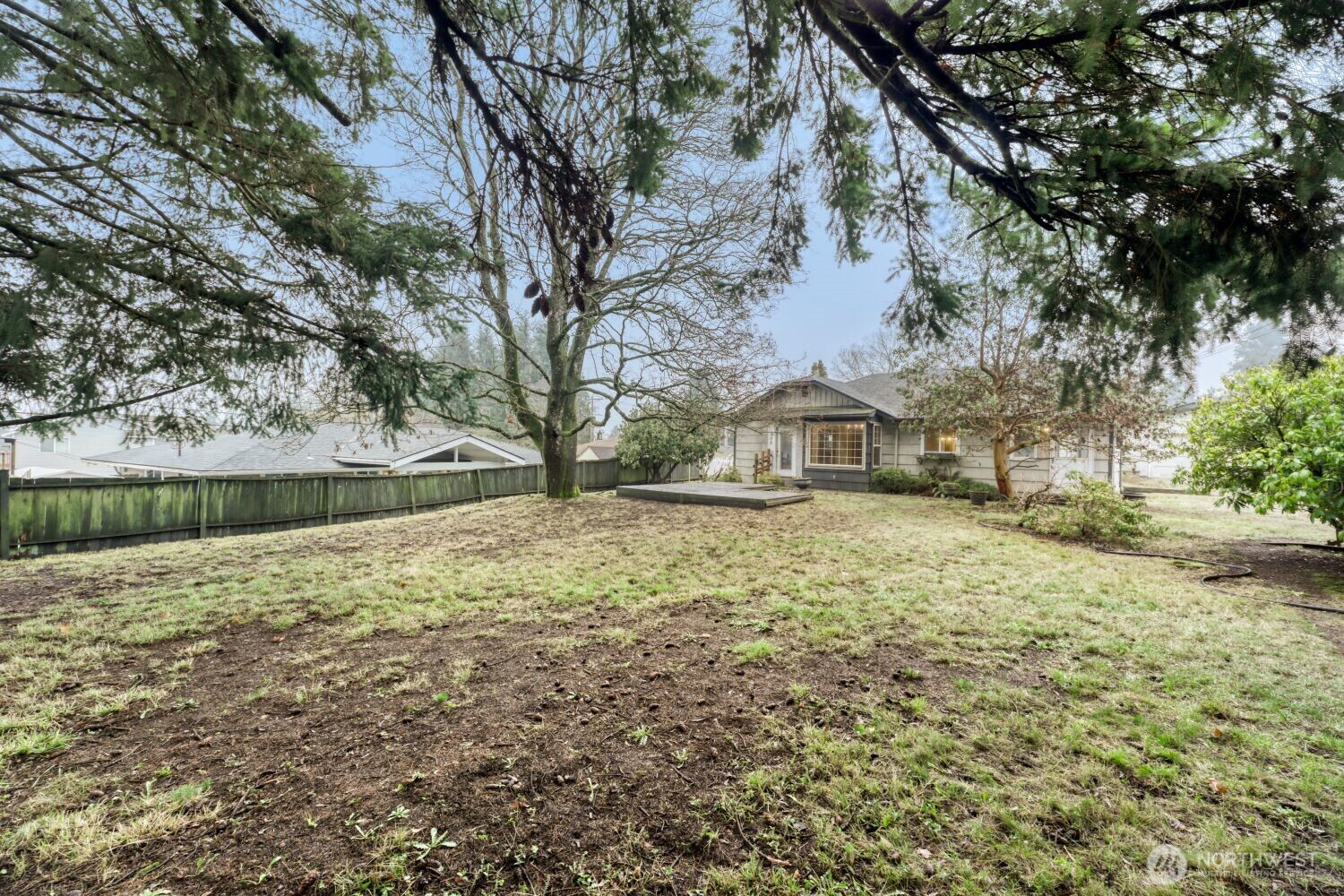 208 78th Place Southwest Everett, WA 98203 - Photo 4 of 36 a front view of a house with a yard