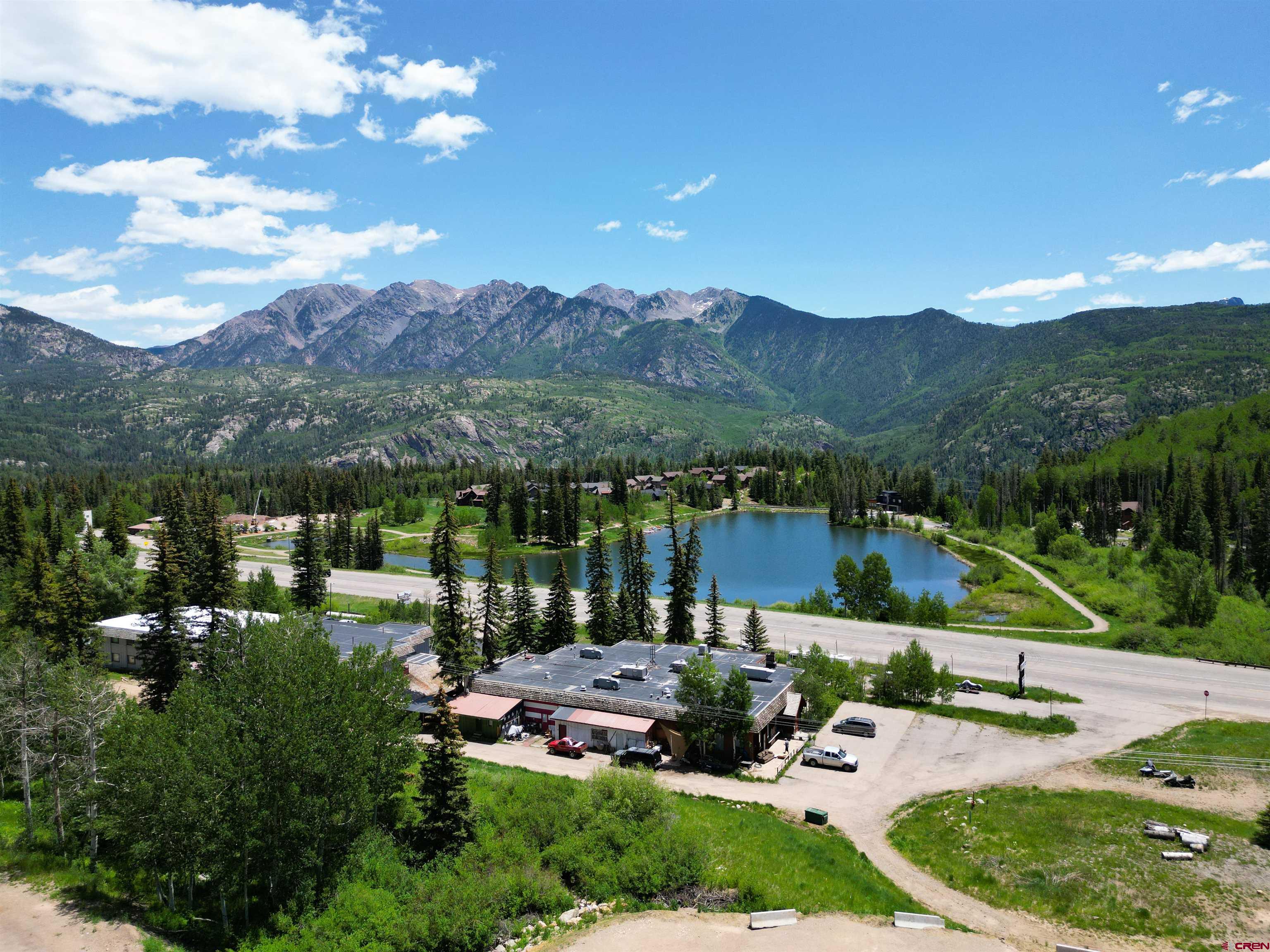 a view of a garden with a lake