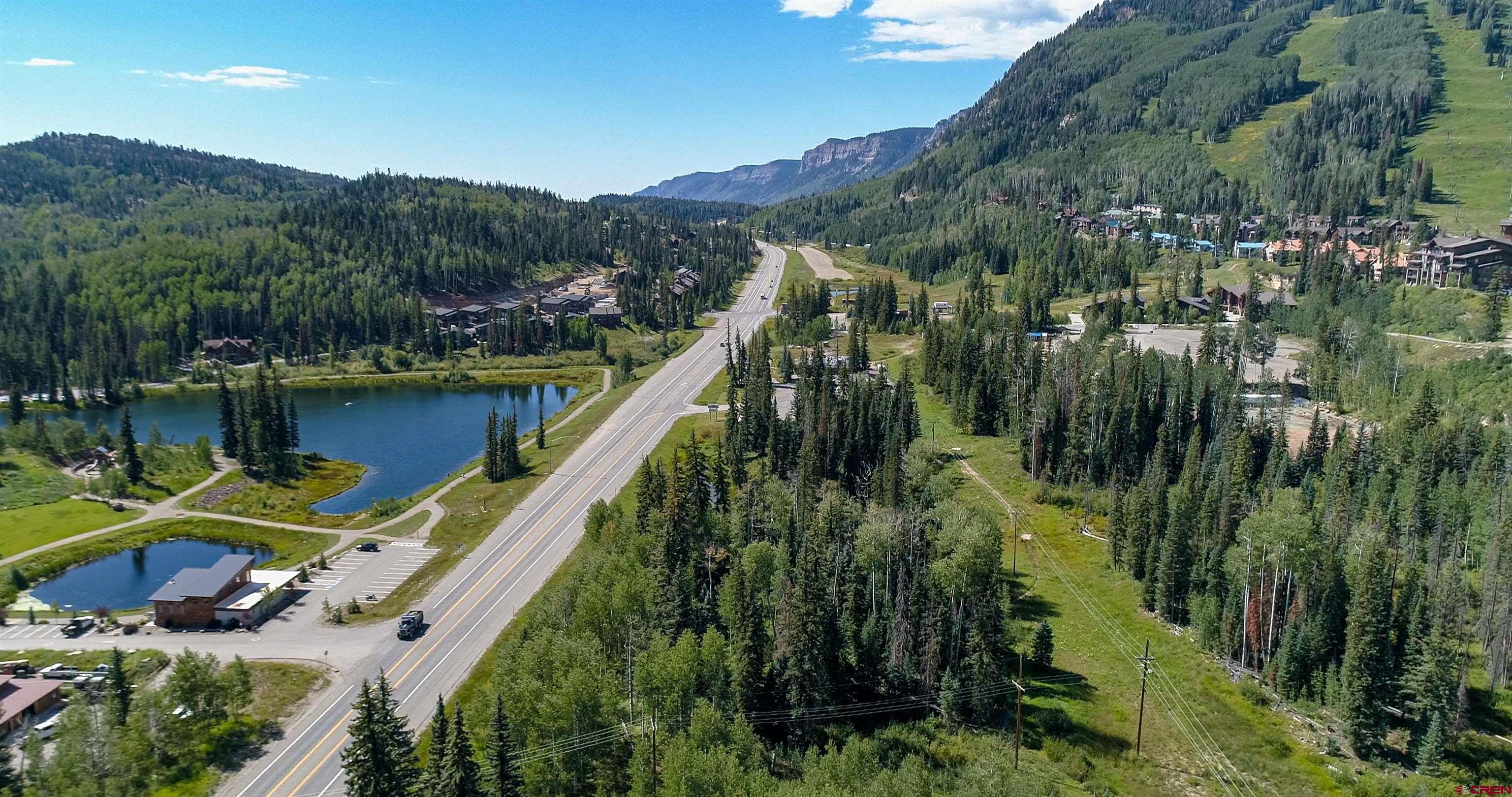 49617 Highway 550 Durango, CO 81301 - Photo 11 of 23 a view of a lake with a mountain in the background