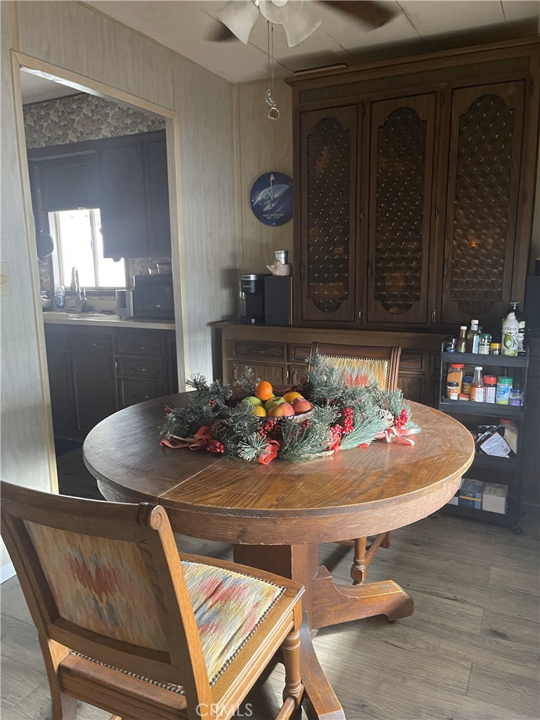 13 Palm Via Anaheim, CA 92801 - Photo 5 of 8 a view of a dining room with furniture and wooden floor