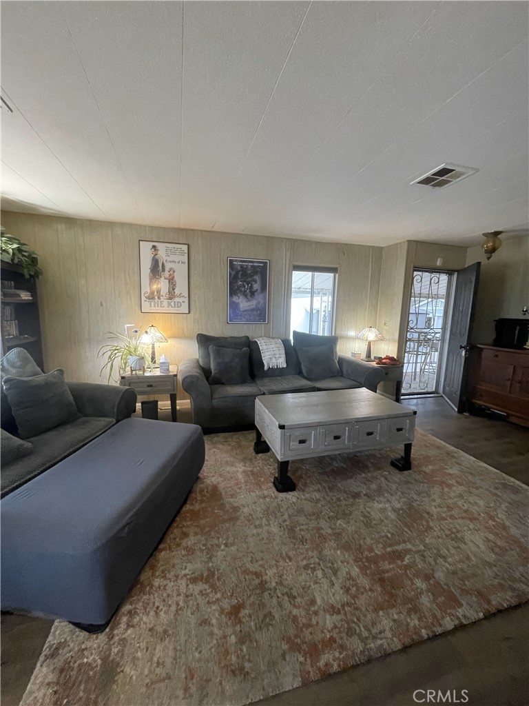 13 Palm Via Anaheim, CA 92801 - Photo 6 of 8 a living room with furniture and a couch