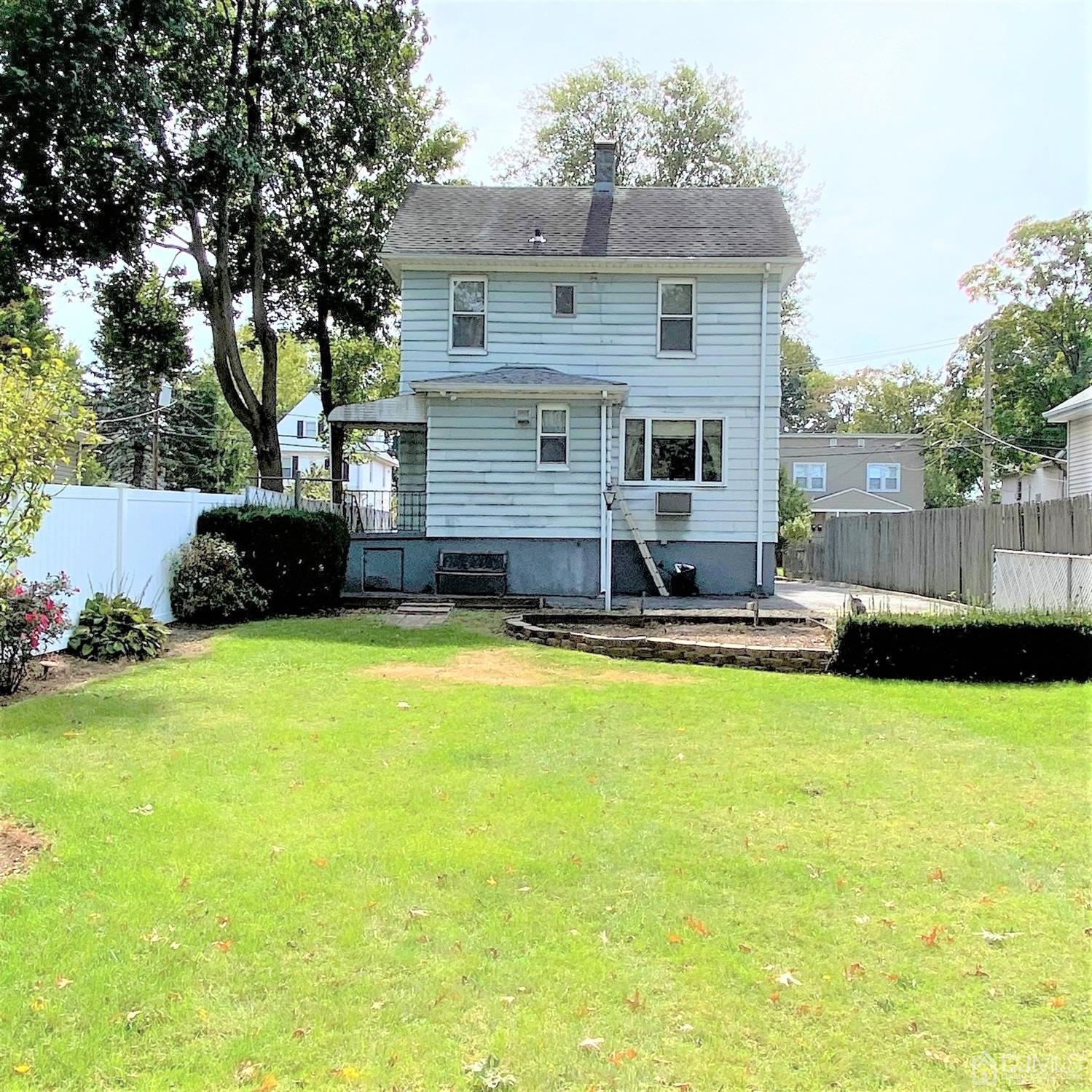 712 Center Street Dunellen, NJ 08812 - Photo 4 of 24 a view of a house with swimming pool and sitting area