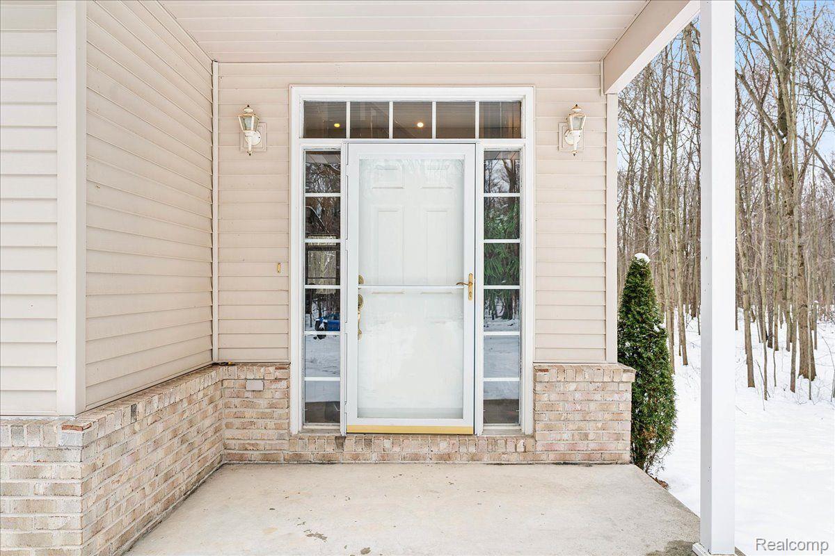 21851 Prince Road Belleville, MI 48111 - Photo 5 of 59 Welcoming covered front porch