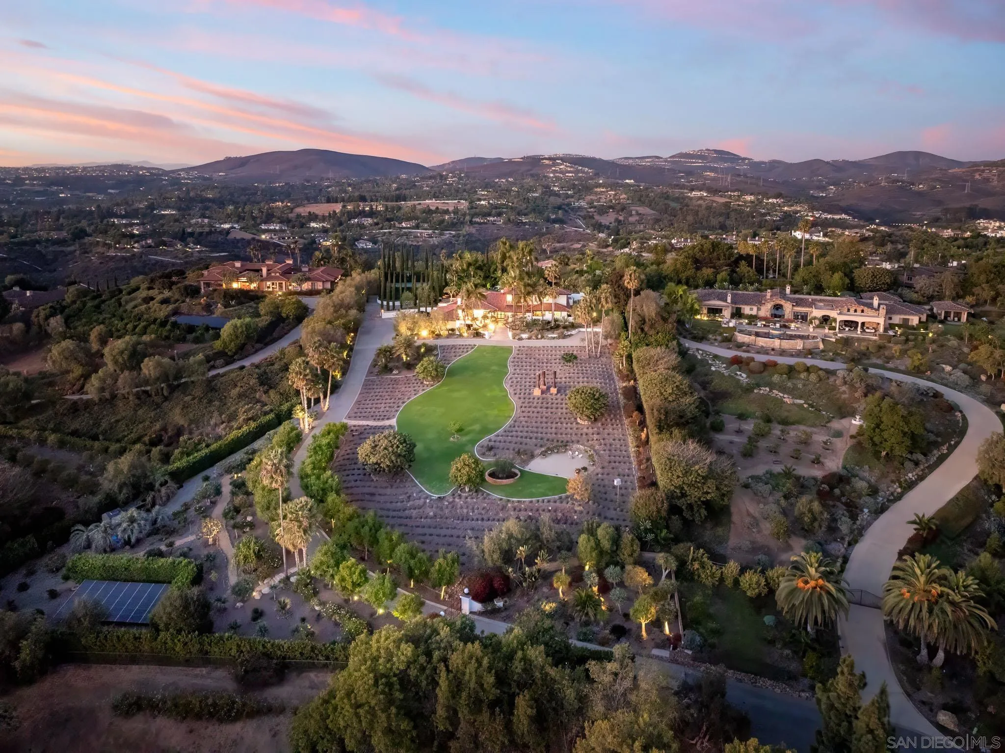 18245 Paseo Victoria Rancho Santa Fe, CA 92067 - Photo 3 of 40 a view of a city with mountains in the background
