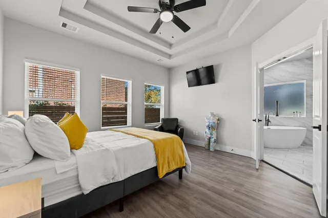a view of living room with furniture and windows
