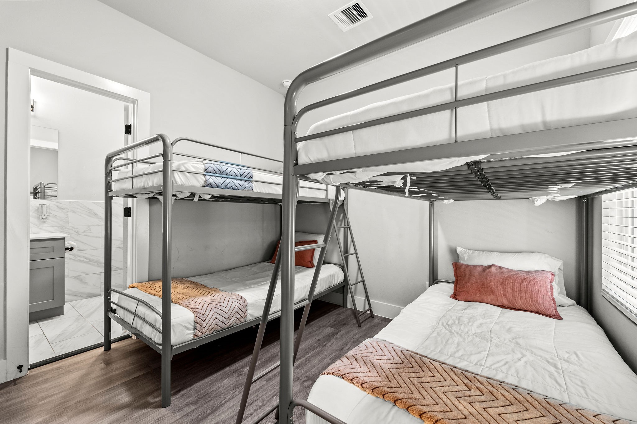 507 Carl Street Houston, TX 77009 - Photo 22 of 24 a bedroom with a bed and a mirror