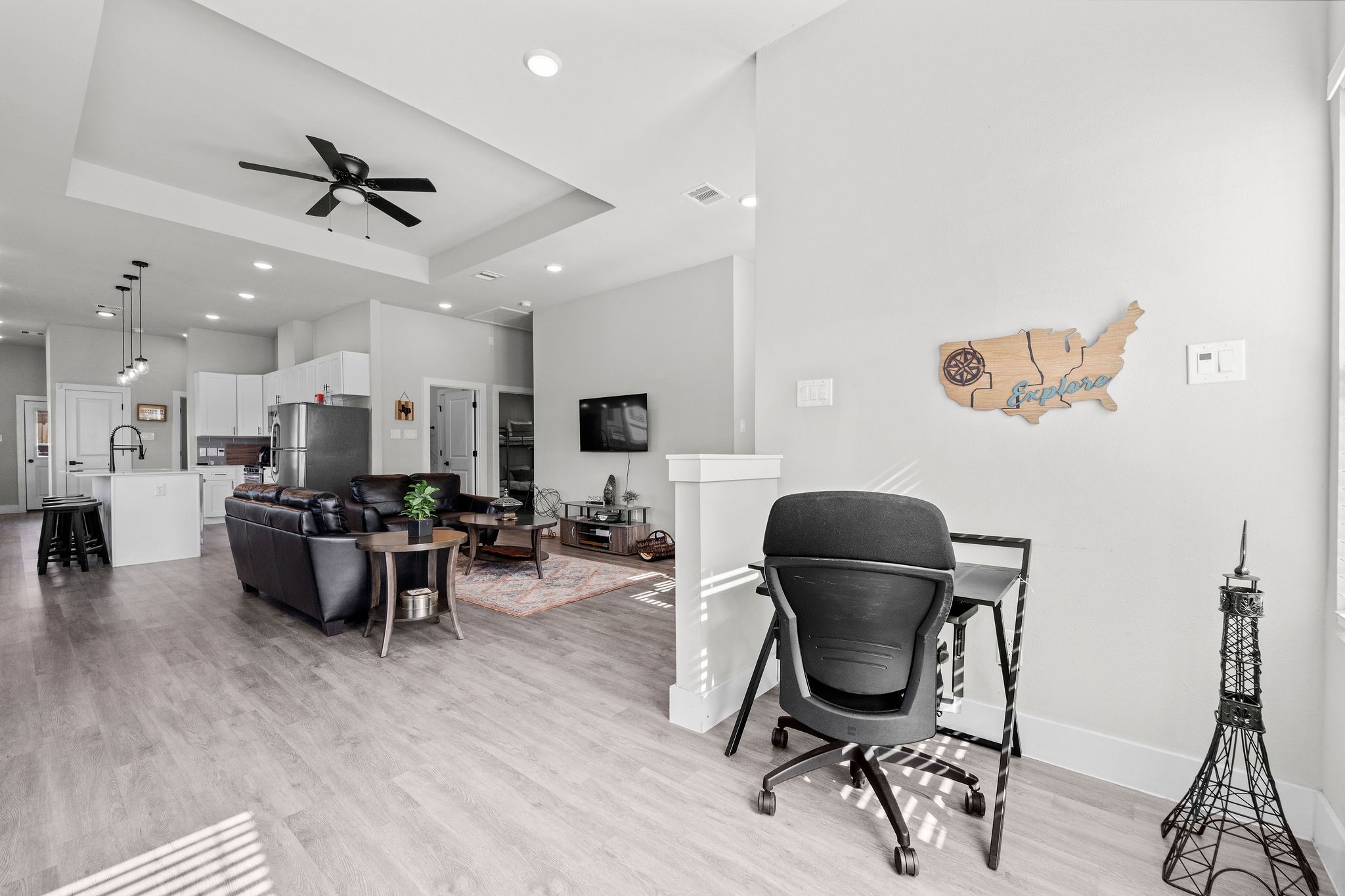 507 Carl Street Houston, TX 77009 - Photo 3 of 24 a view of a workspace with furniture and a window